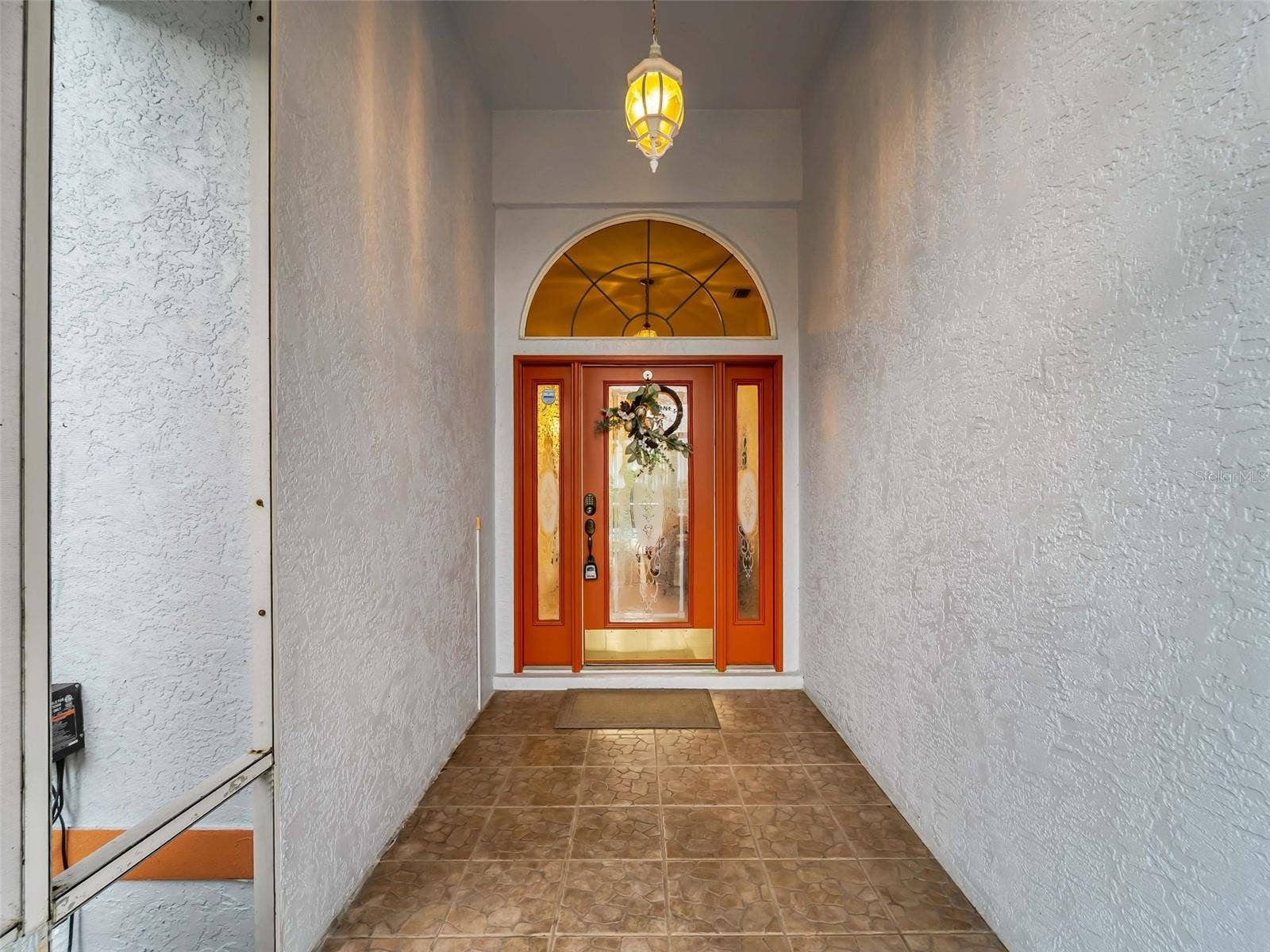 FrontPorch_9336StPaulDr_PortCharlotte_ArchedEntry_Entry.jpg