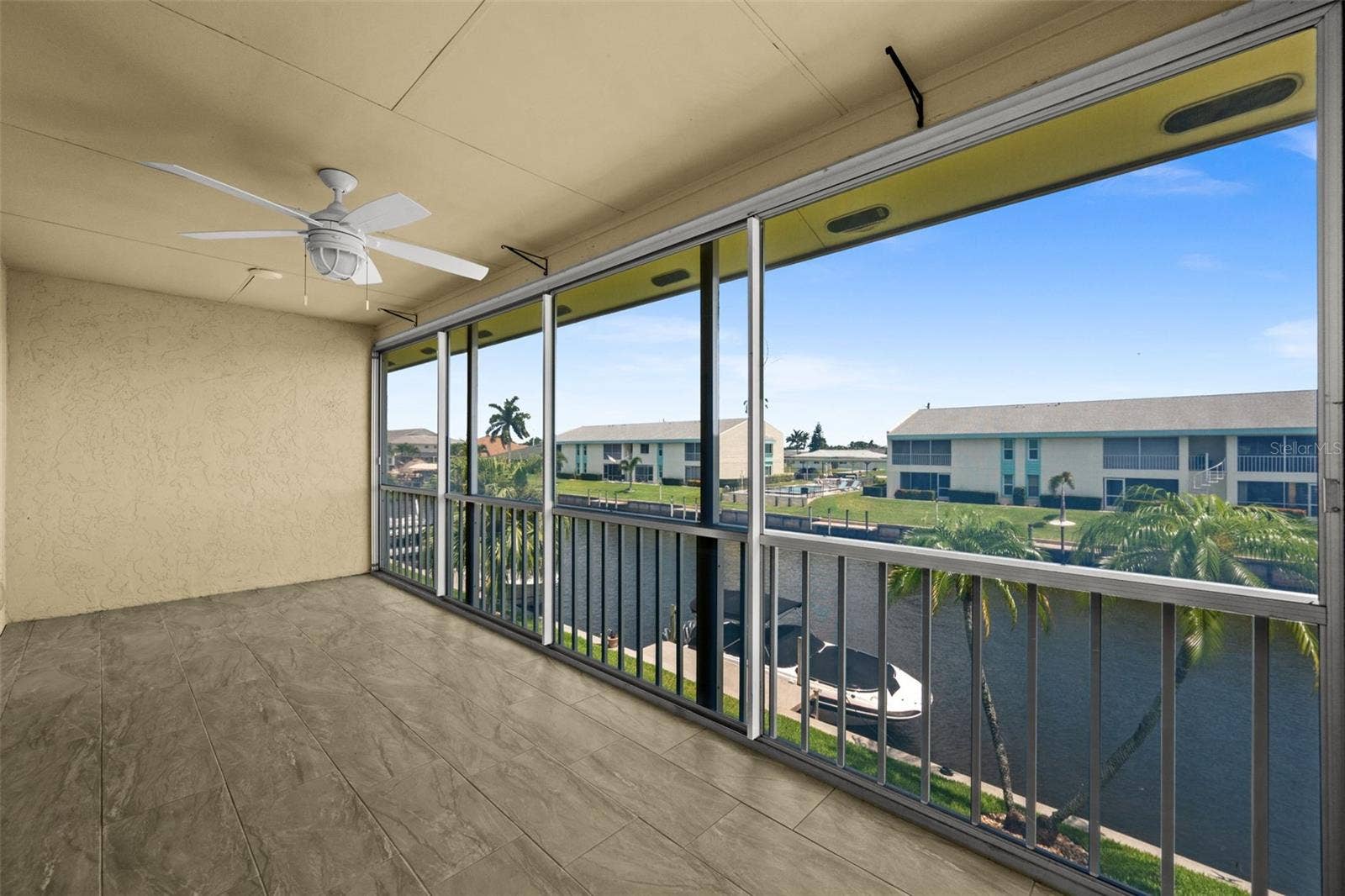 1345 SE 40TH TERRACE, #2E, Cape Coral, FL 33904 Lanai overlooking the gulf access canal