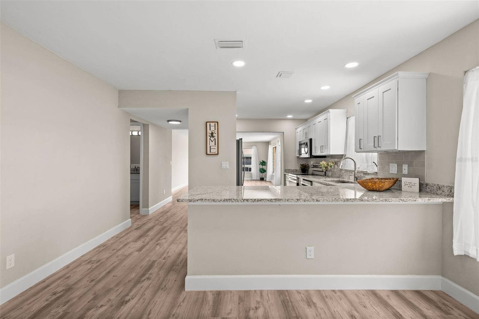1345 SE 40TH TERRACE, #2E, Cape Coral, FL 33904 Kitchen with breakfast bar
