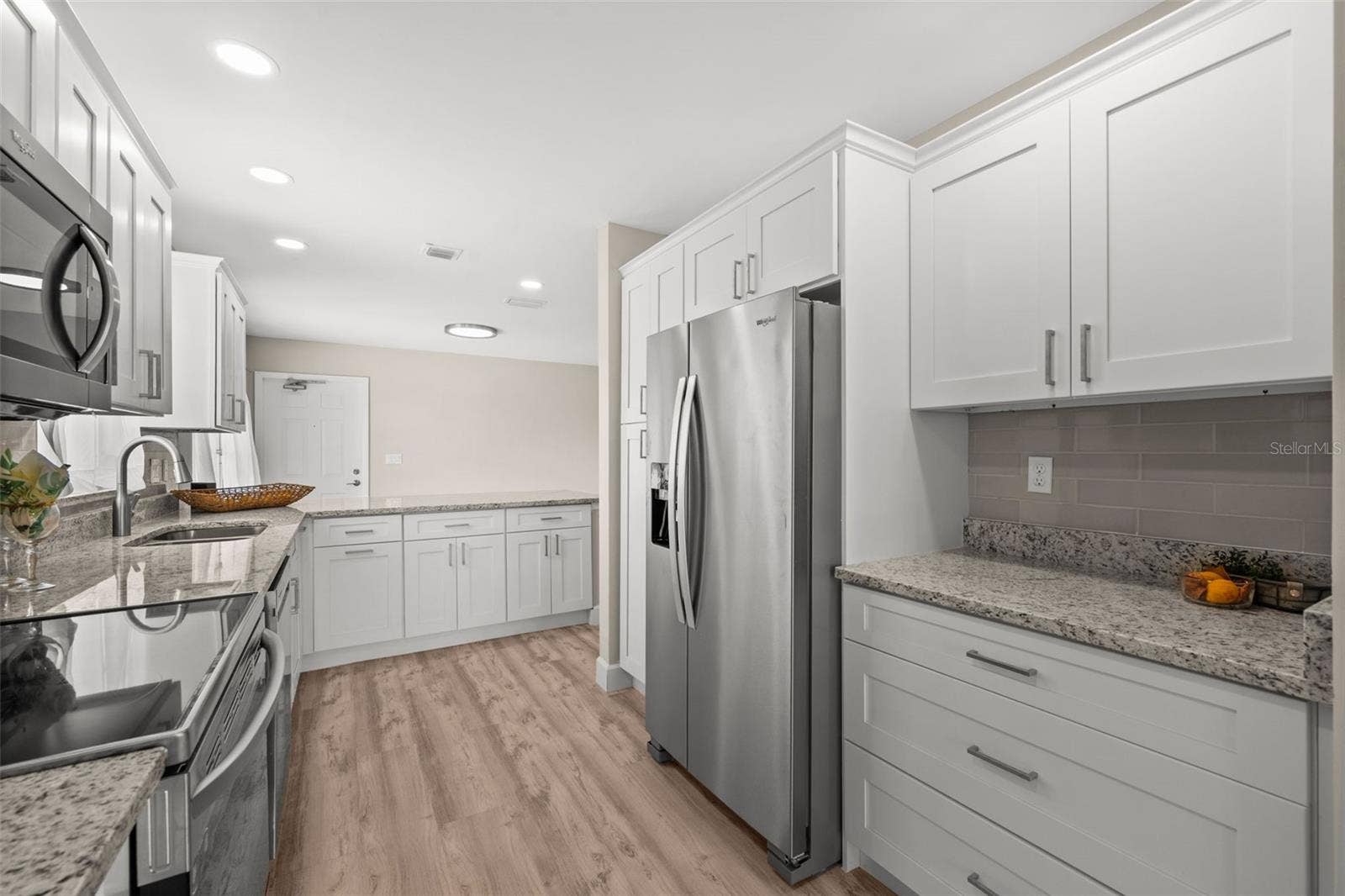 1345 SE 40TH TERRACE, #2E, Cape Coral, FL 33904 Well appointed kitchen with stainless appliances