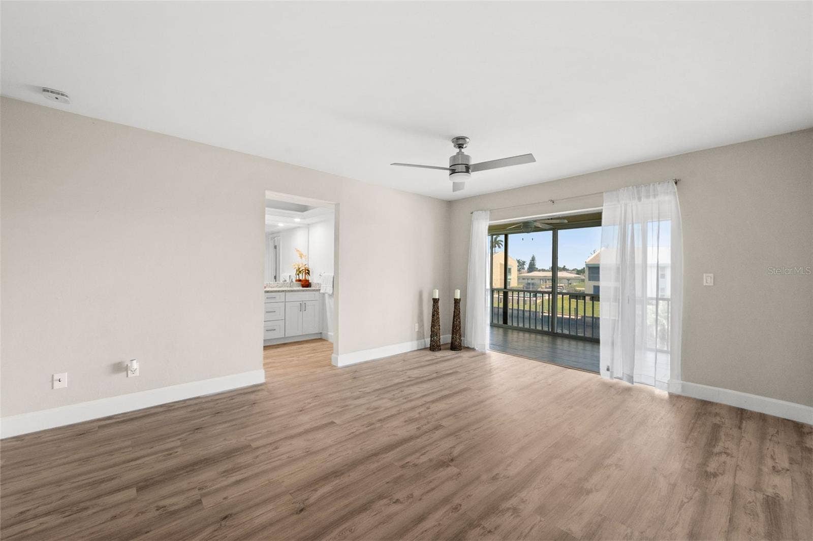 1345 SE 40TH TERRACE, #2E, Cape Coral, FL 33904 Primary bedroom with direct access to the lanai