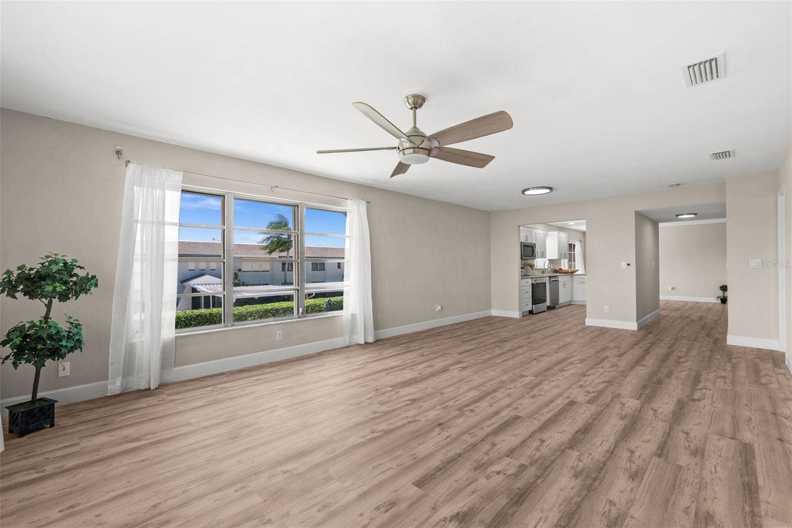1345 SE 40TH TERRACE, #2E, Cape Coral, FL 33904 Living Room also overlooks the pool