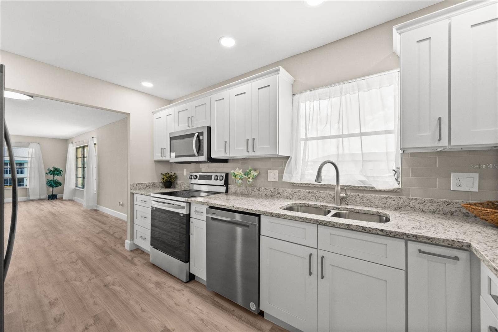 1345 SE 40TH TERRACE, #2E, Cape Coral, FL 33904 Open kitchen with lots of cabinets