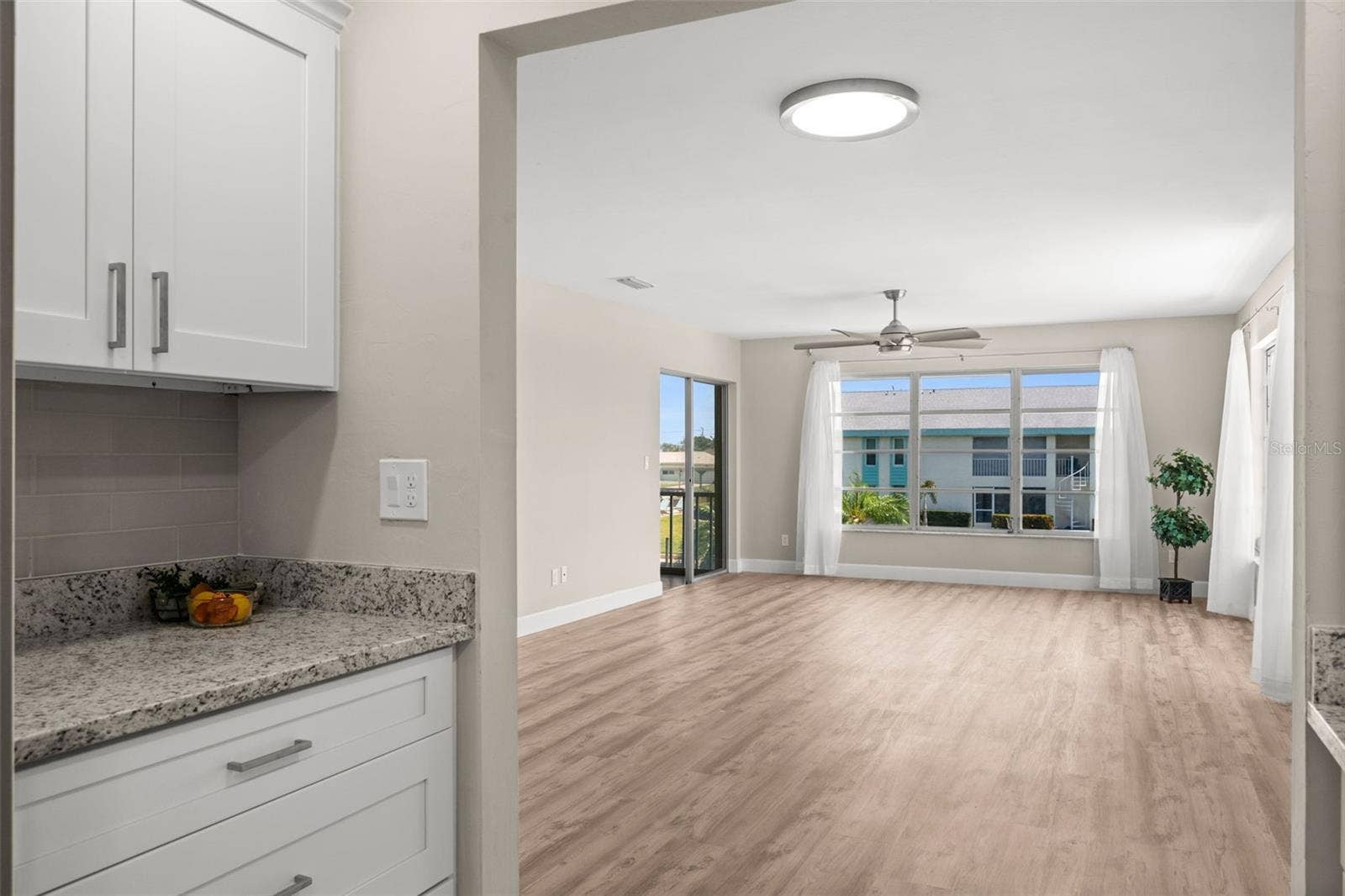 1345 SE 40TH TERRACE, #2E, Cape Coral, FL 33904 Looking from the kitchen toward the Living Room