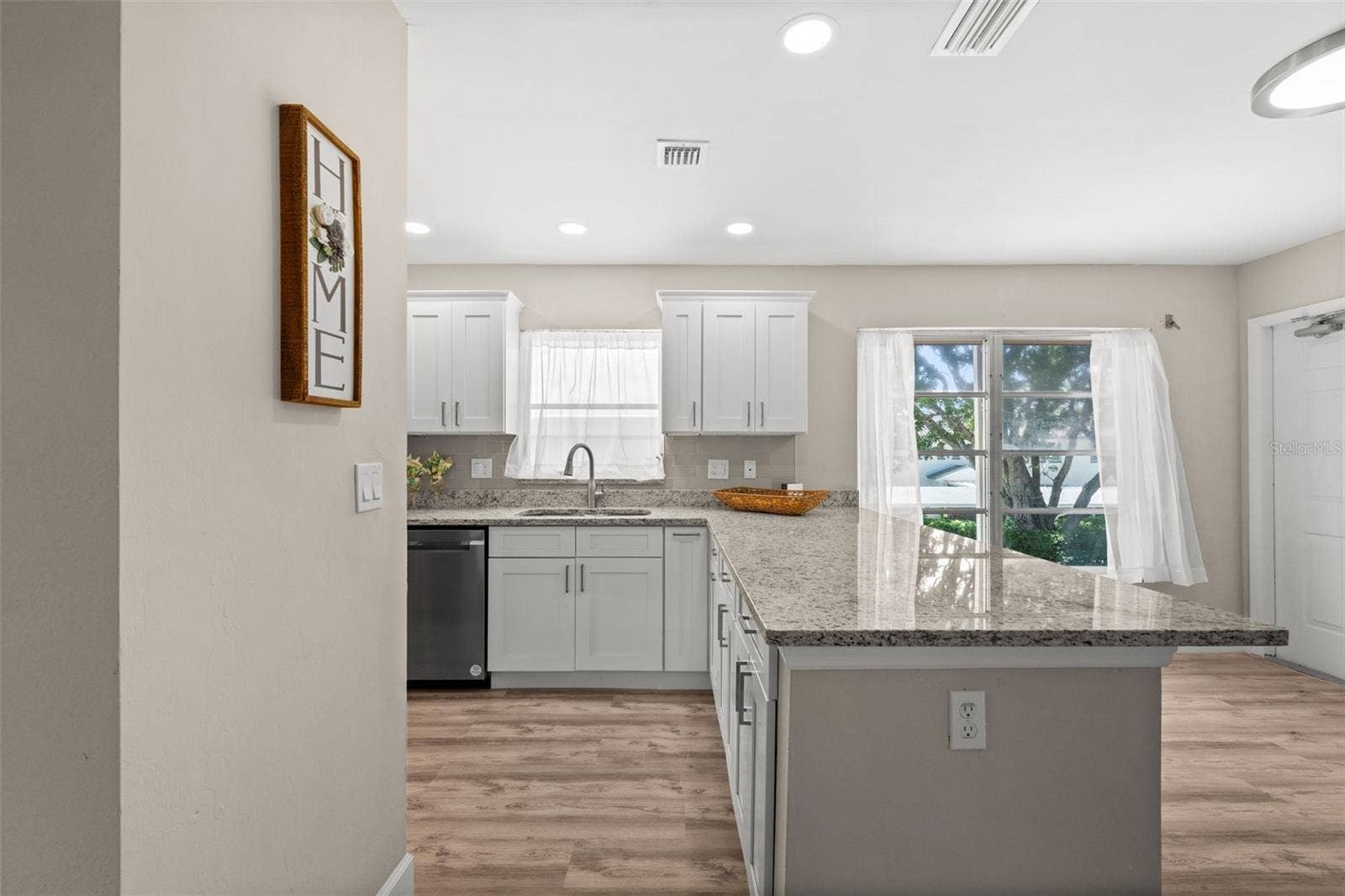 1345 SE 40TH TERRACE, #2E, Cape Coral, FL 33904 Looking from the kitchen to the front entry