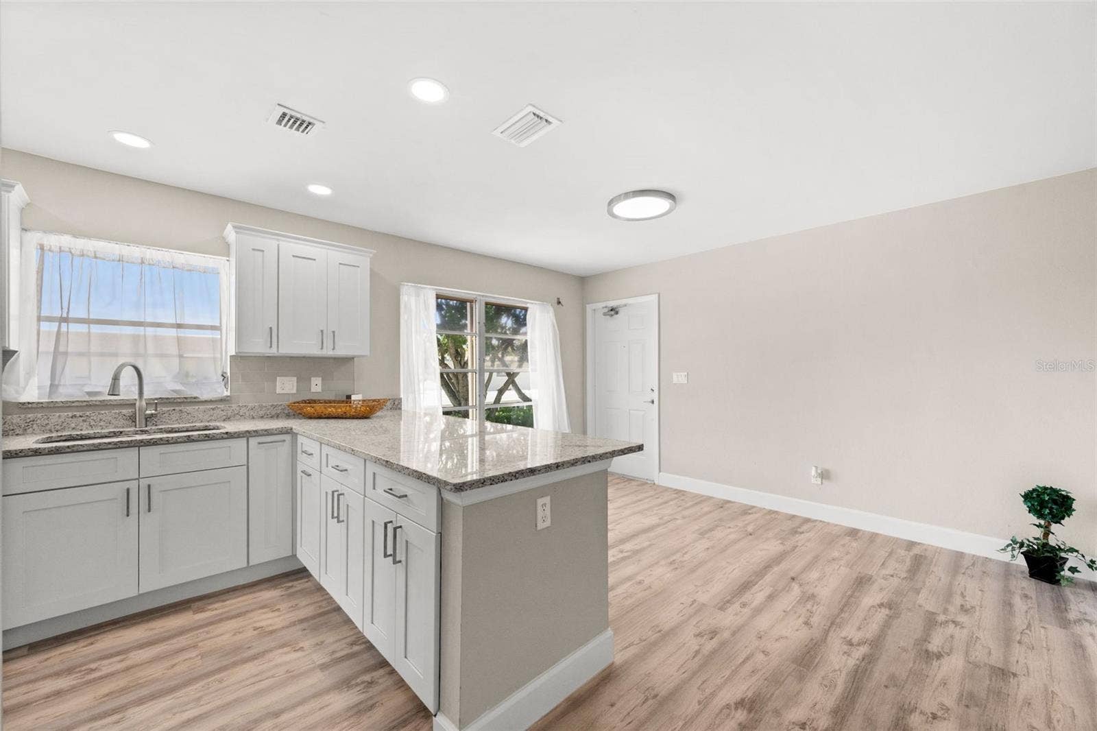 1345 SE 40TH TERRACE, #2E, Cape Coral, FL 33904 Kitchen and entry with breakfast nook