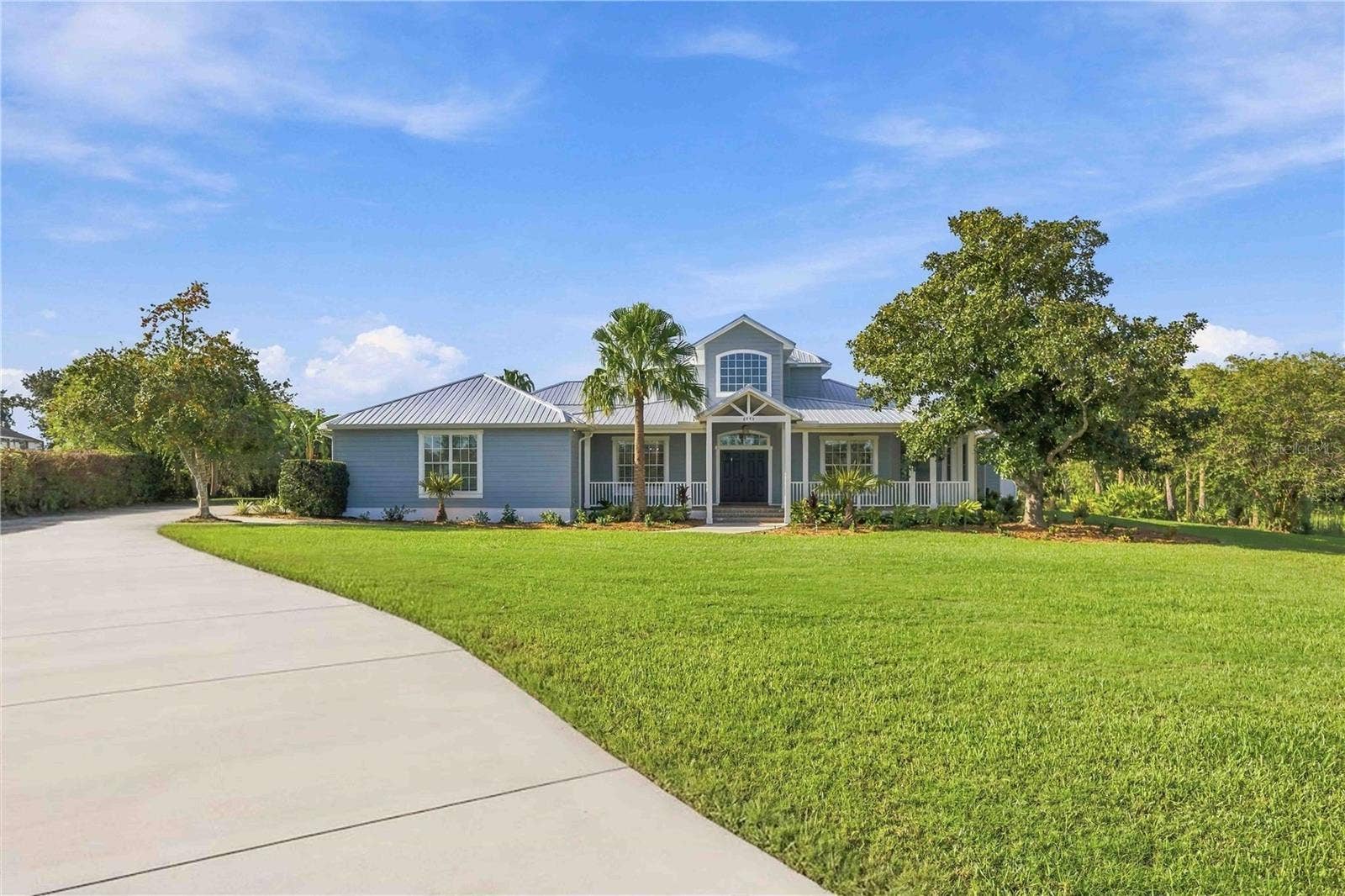 8543 SW AVIARY ROAD, Arcadia, FL 34269 Long driveway leading to the home