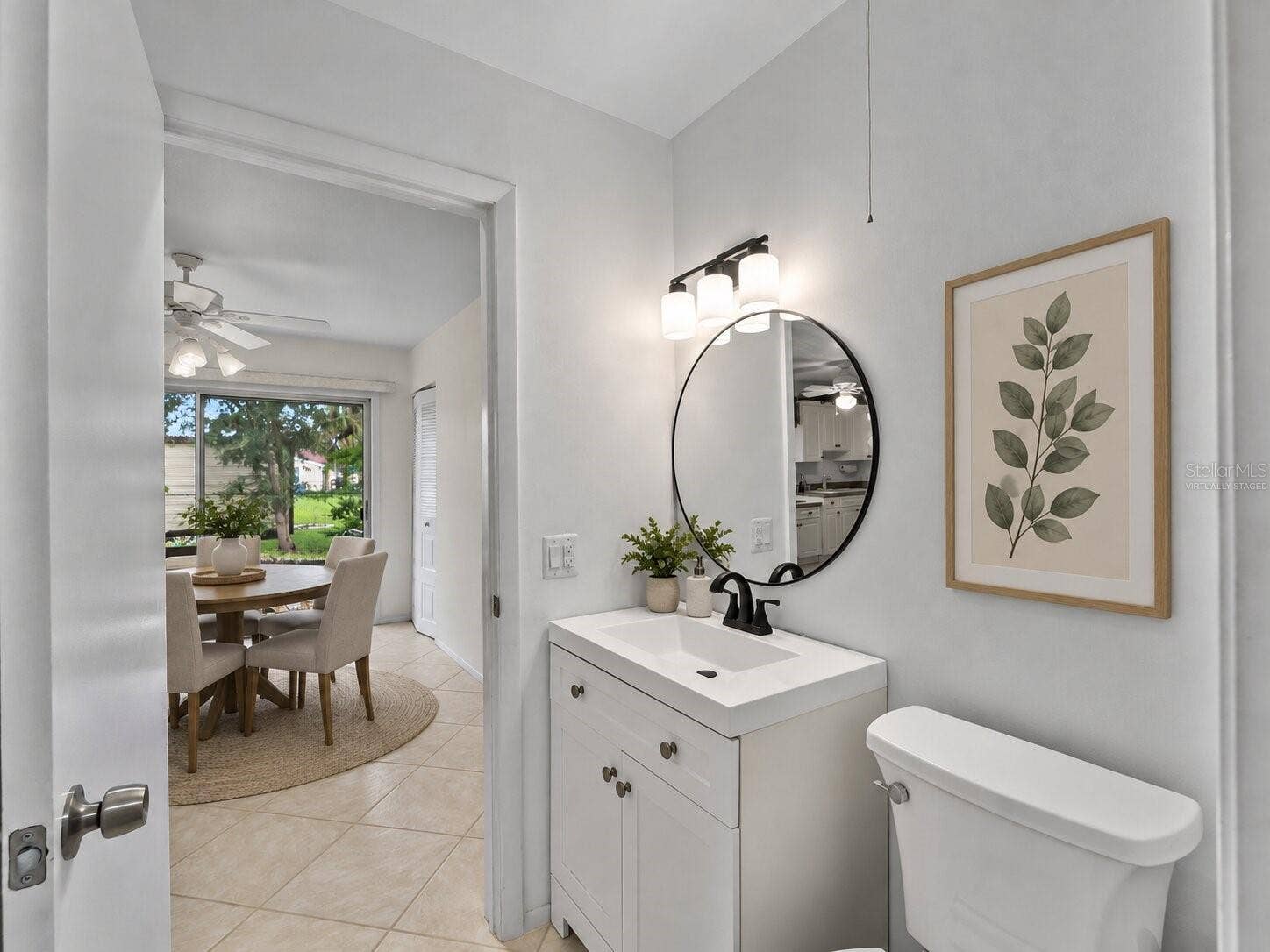 8130 PICKWICK ROAD, North Port, FL 34287 Virtually Staged Bath_8130PickwickRd_NorthPort_UpdatedVanity_Entry.jpg