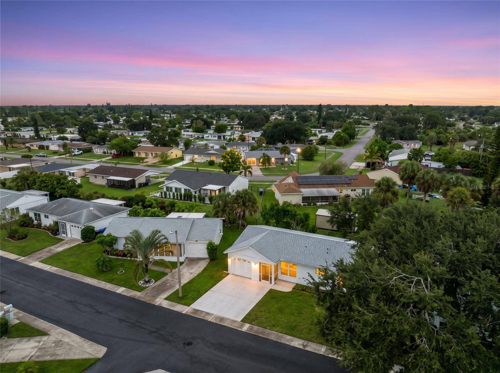8130 PICKWICK ROAD, North Port, FL 34287 Aerial_8130PickwickRd_NorthPort_Neighborhood_Twilight.jpg
