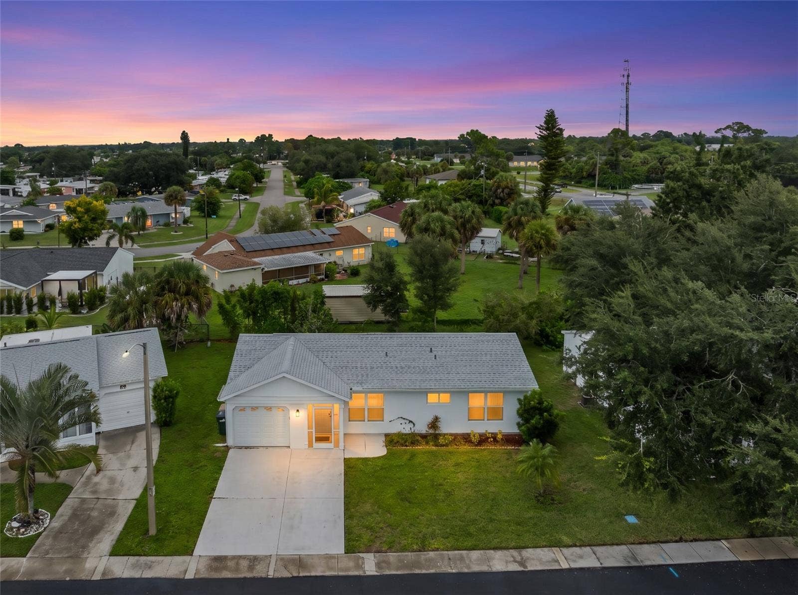 8130 PICKWICK ROAD, North Port, FL 34287 Aerial_8130PickwickRd_NorthPort_CurbAppeal_Twilight2.jpg