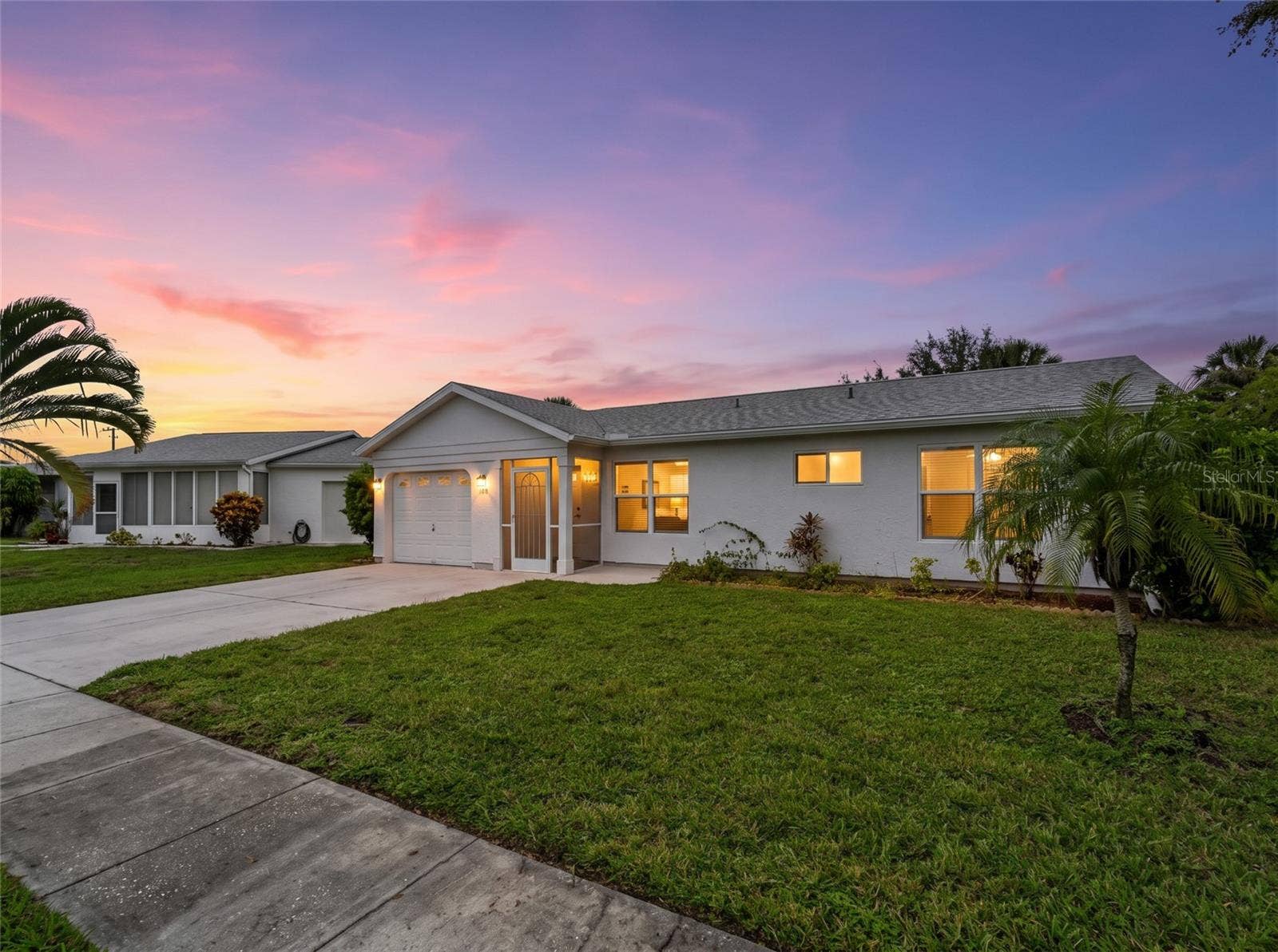 8130 PICKWICK ROAD, North Port, FL 34287 FrontExterior_8130PickwickRd_NorthPort_Landscaping_Twilight.jpg