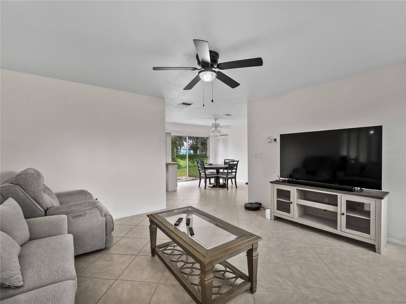 8130 PICKWICK ROAD, North Port, FL 34287 LivingRoom_8130PickwickRd_NorthPort_EntertainmentCenter_Corner.jpg