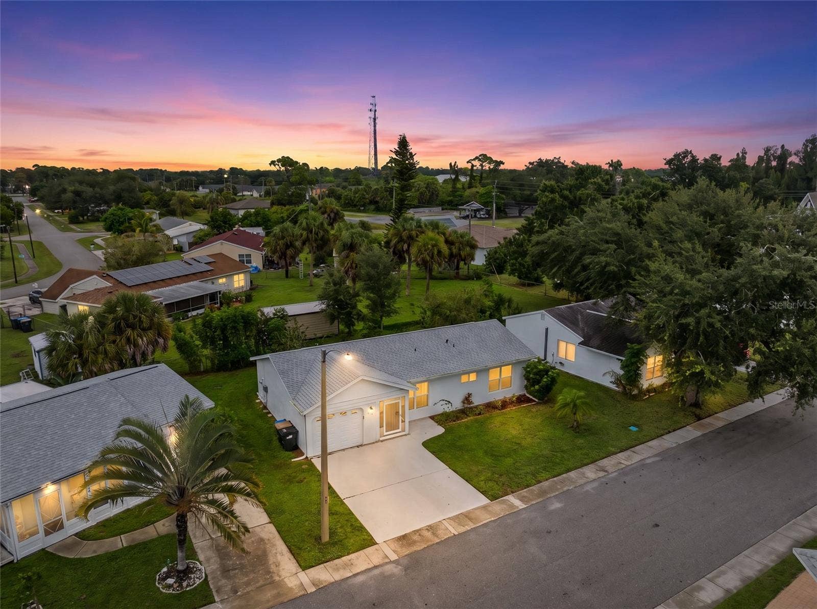 8130 PICKWICK ROAD, North Port, FL 34287 Aerial_8130PickwickRd_NorthPort_CurbAppeal_Twilight.jpg