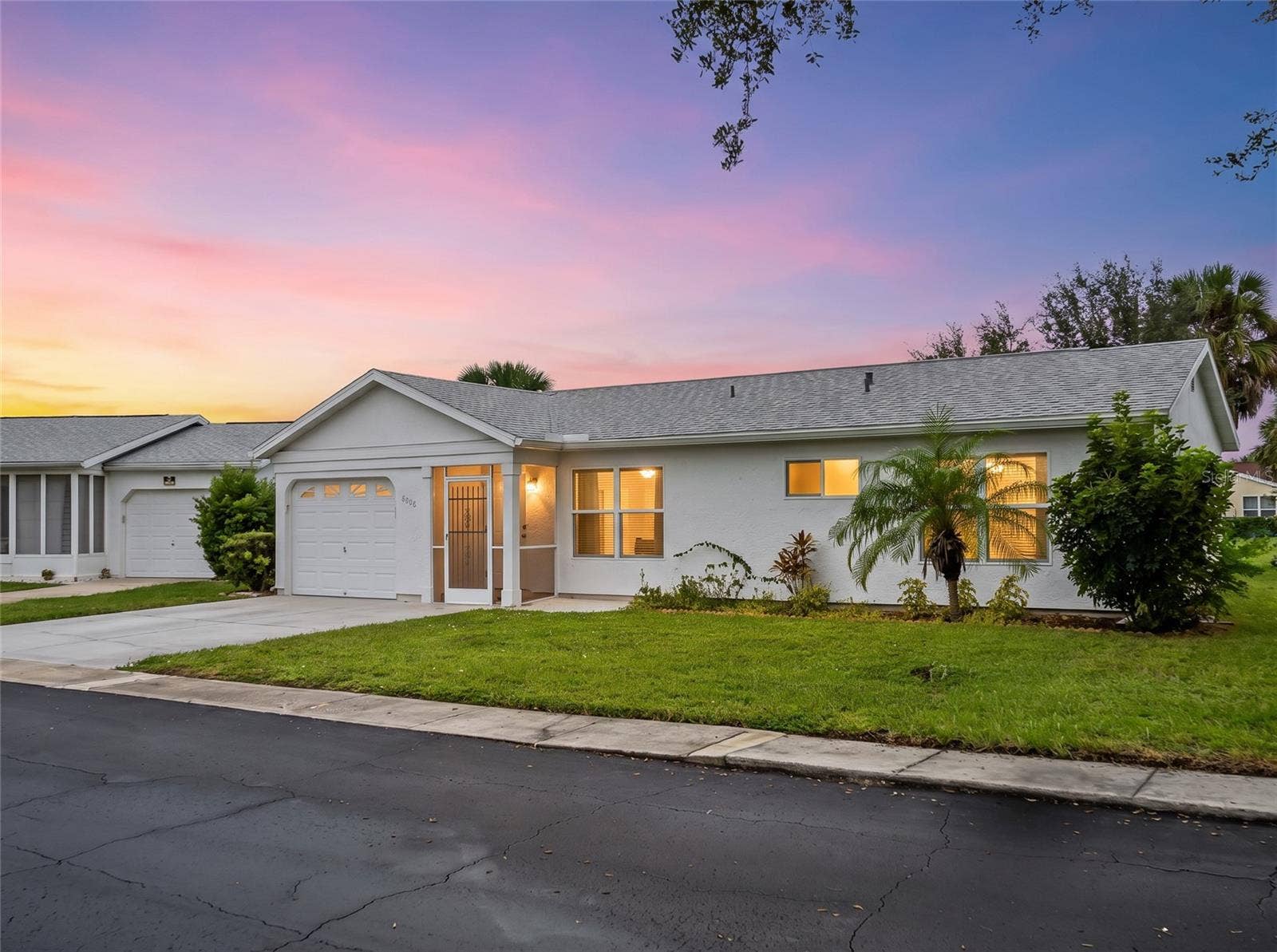 8130 PICKWICK ROAD, North Port, FL 34287 FrontExterior_8130PickwickRd_NorthPort_CurbAppeal_Twilight2.jpg