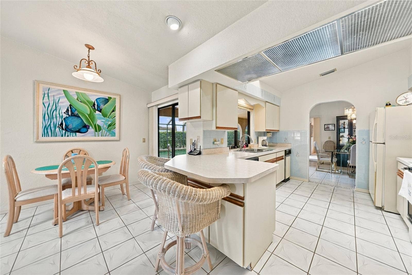 5242 FORBES TERRACE, Port Charlotte, FL 33981 Kitchen with breakfast bar