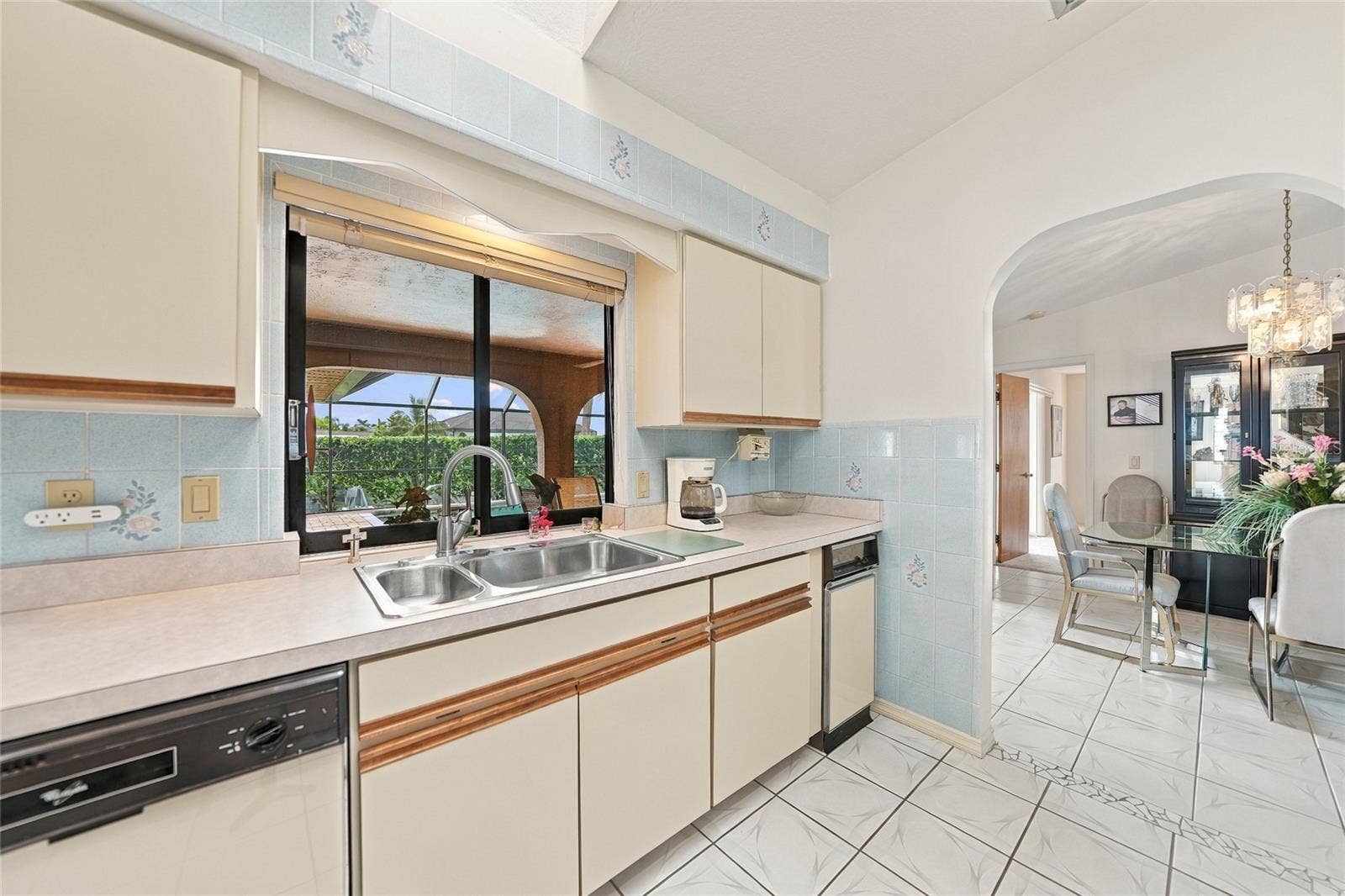 5242 FORBES TERRACE, Port Charlotte, FL 33981 Kitchen with water and pool views