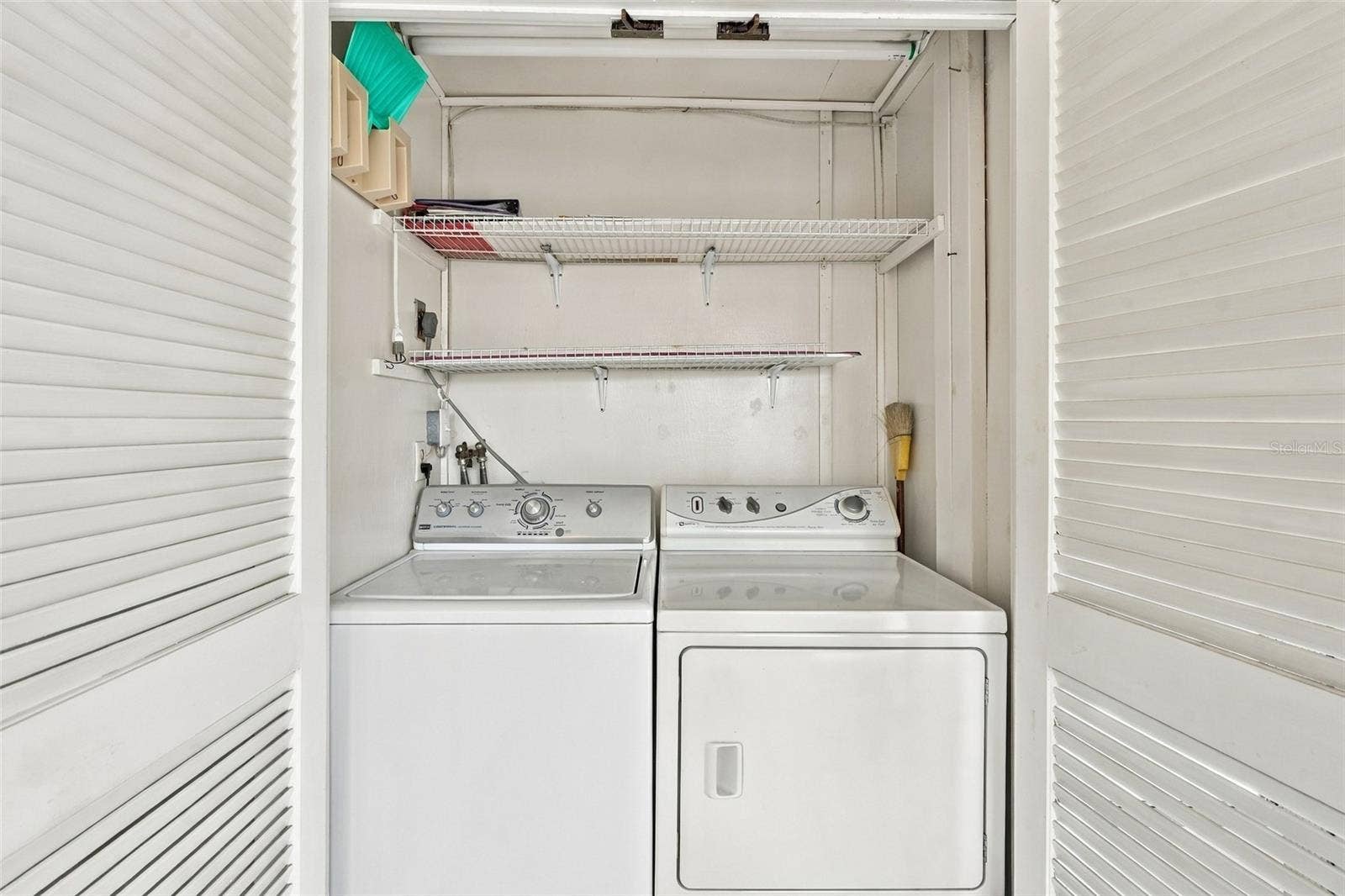 4158 TAMIAMI TRAIL, #P4, Port Charlotte, FL 33952 Laundry closet on back Lanai