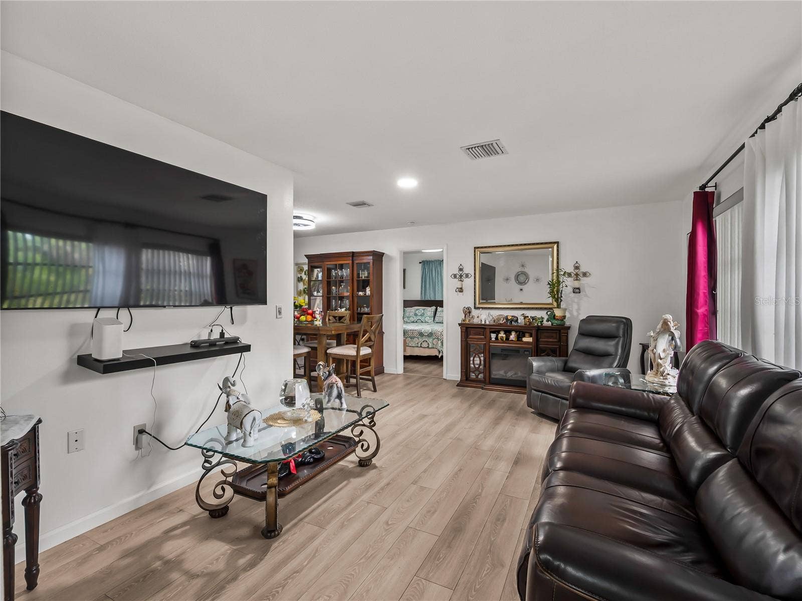 LivingRoom_20307SilentAve_PortCharlotte_OpenConcept_Wide.jpg