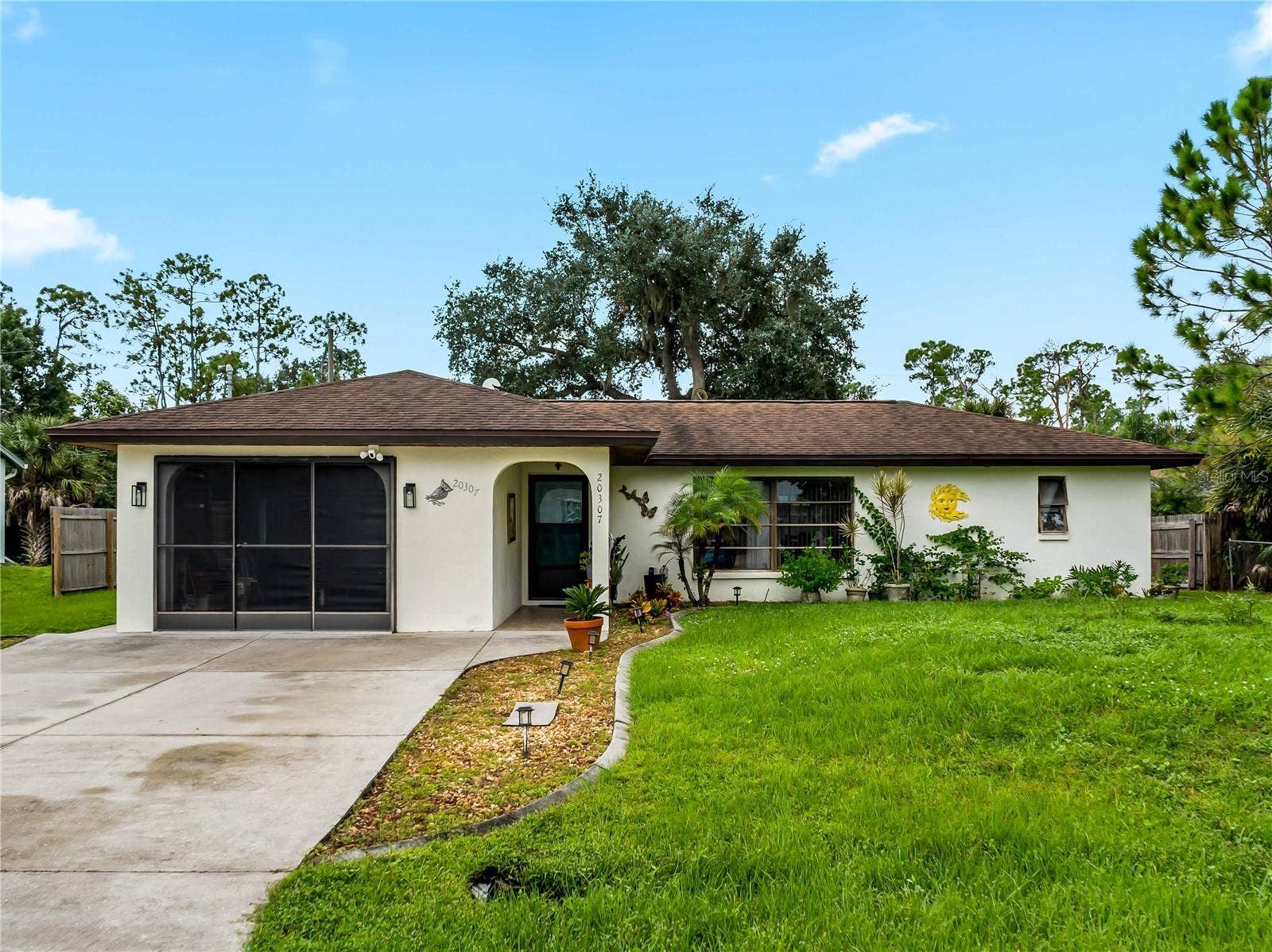 FrontExterior_20307SilentAve_PortCharlotte_CurbAppeal_Wide.jpg
