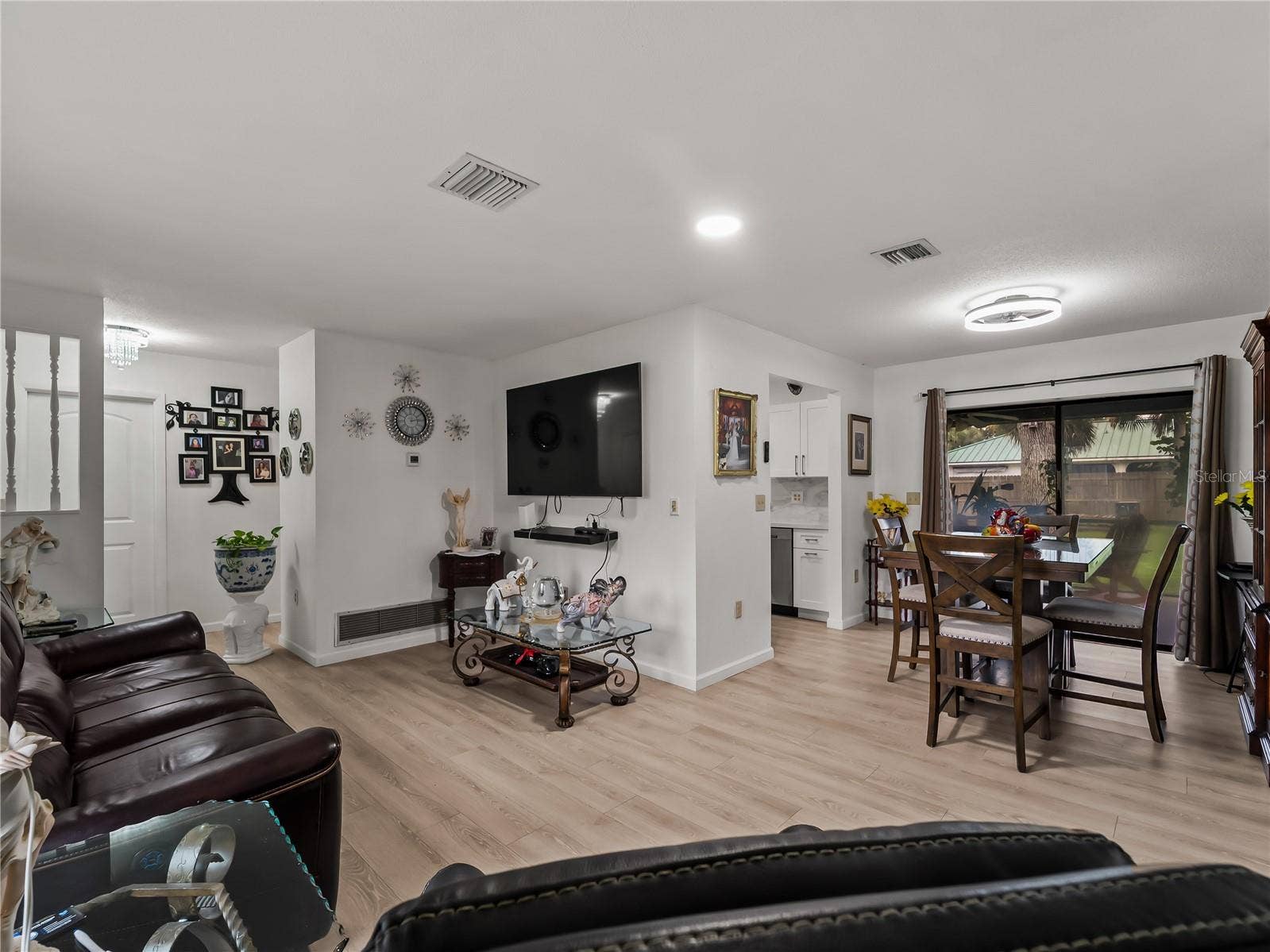 DiningLiving_20307SilentAve_PortCharlotte_OpenConcept_Wide.jpg
