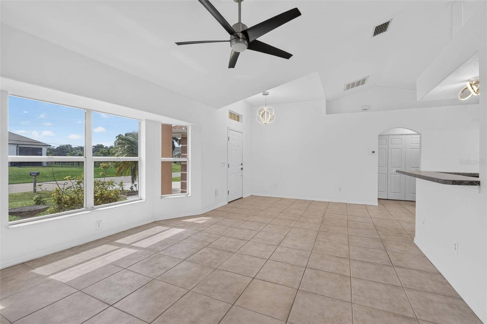 2184 ONONDAGA LANE, Punta Gorda, FL 33983 Living Room and Entry Area (Tinted Windows)