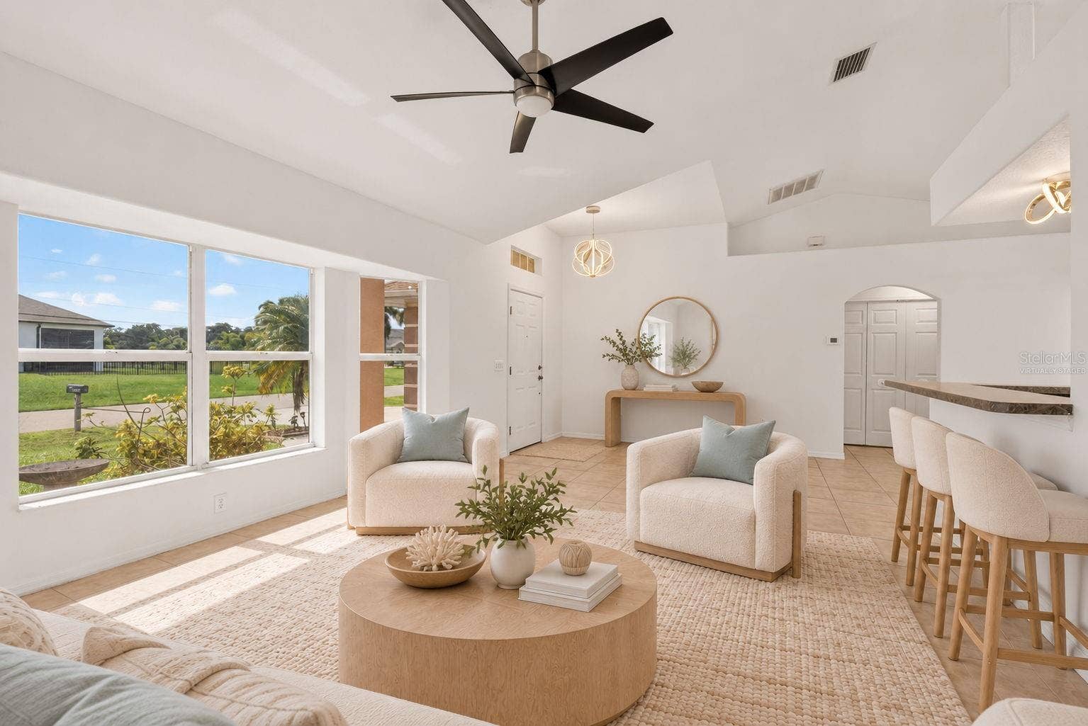 2184 ONONDAGA LANE, Punta Gorda, FL 33983 Virtually Staged Living Room and Entry Area