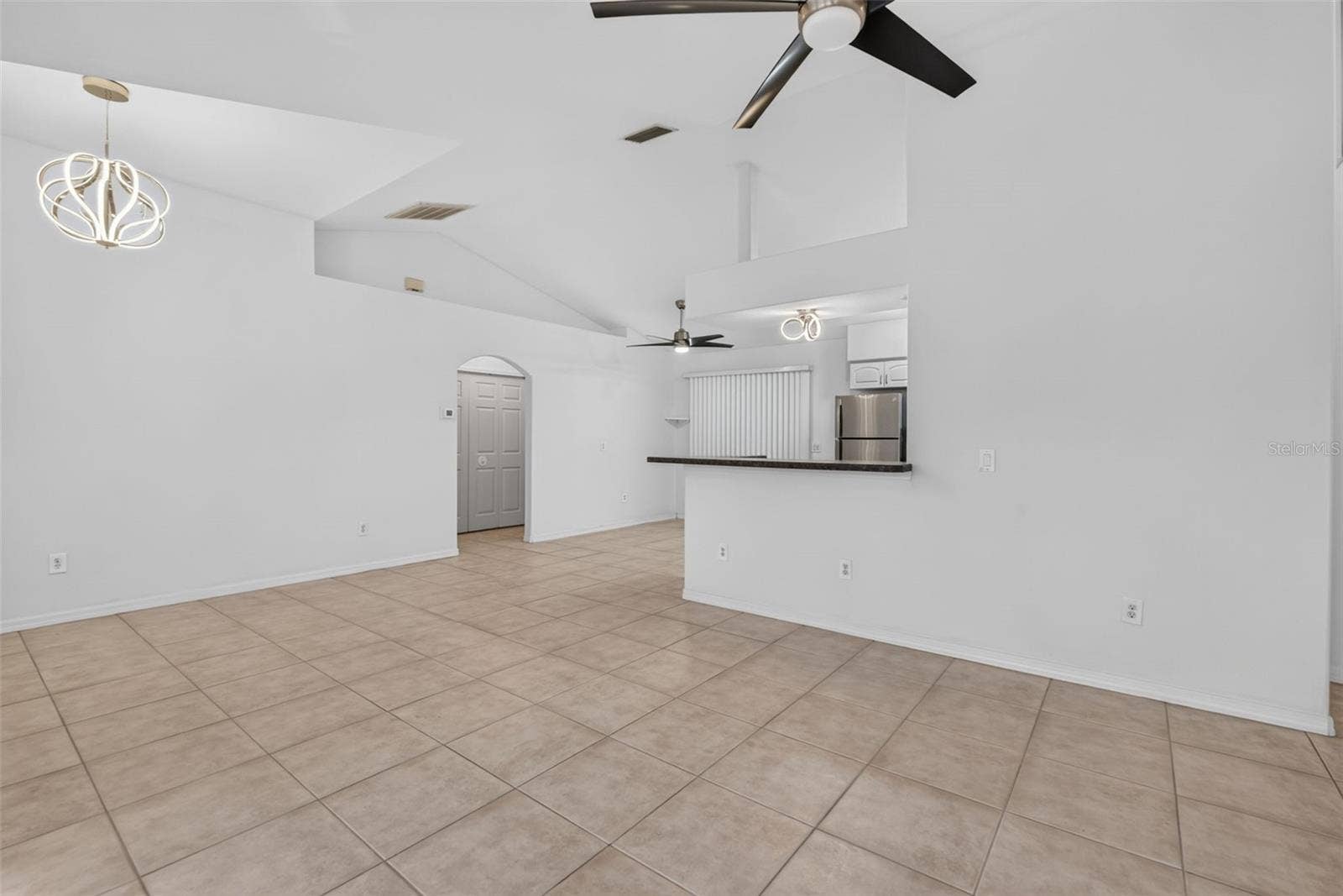 2184 ONONDAGA LANE, Punta Gorda, FL 33983 L-Shaped Living to Dining Area, Breakfast Bar