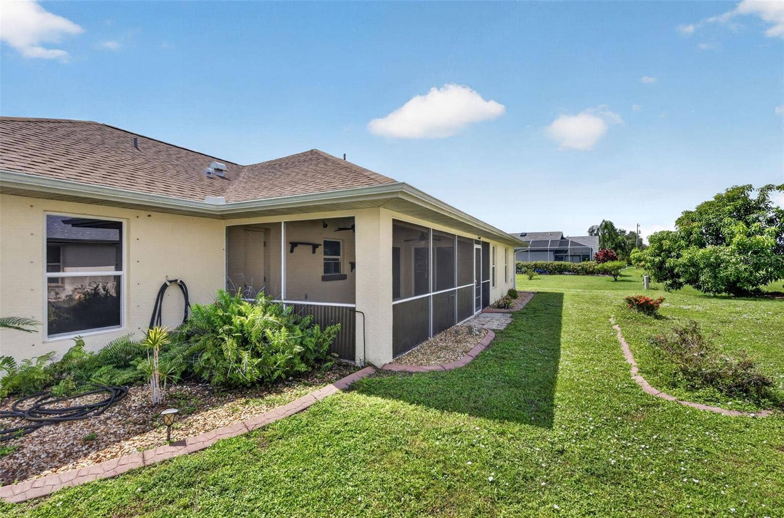 2184 ONONDAGA LANE, Punta Gorda, FL 33983 Exterior View of Screen Enclosed Lanai