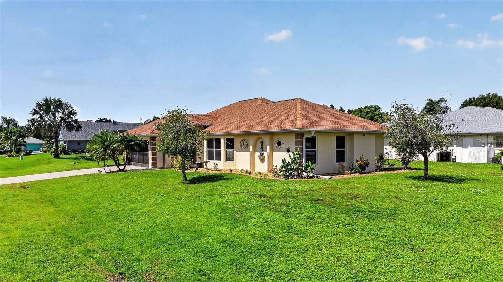 2184 ONONDAGA LANE, Punta Gorda, FL 33983 Front and Eastside View - Southeast Elevation