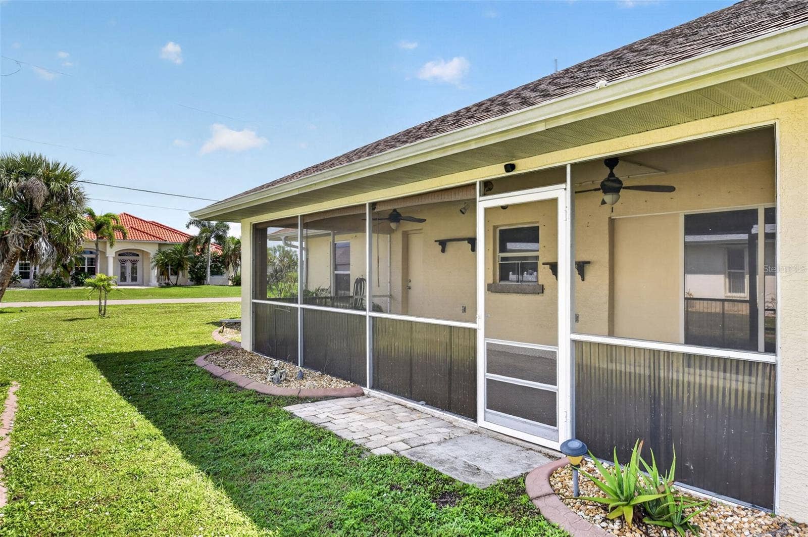 2184 ONONDAGA LANE, Punta Gorda, FL 33983 Rear Yard View - West Elevation