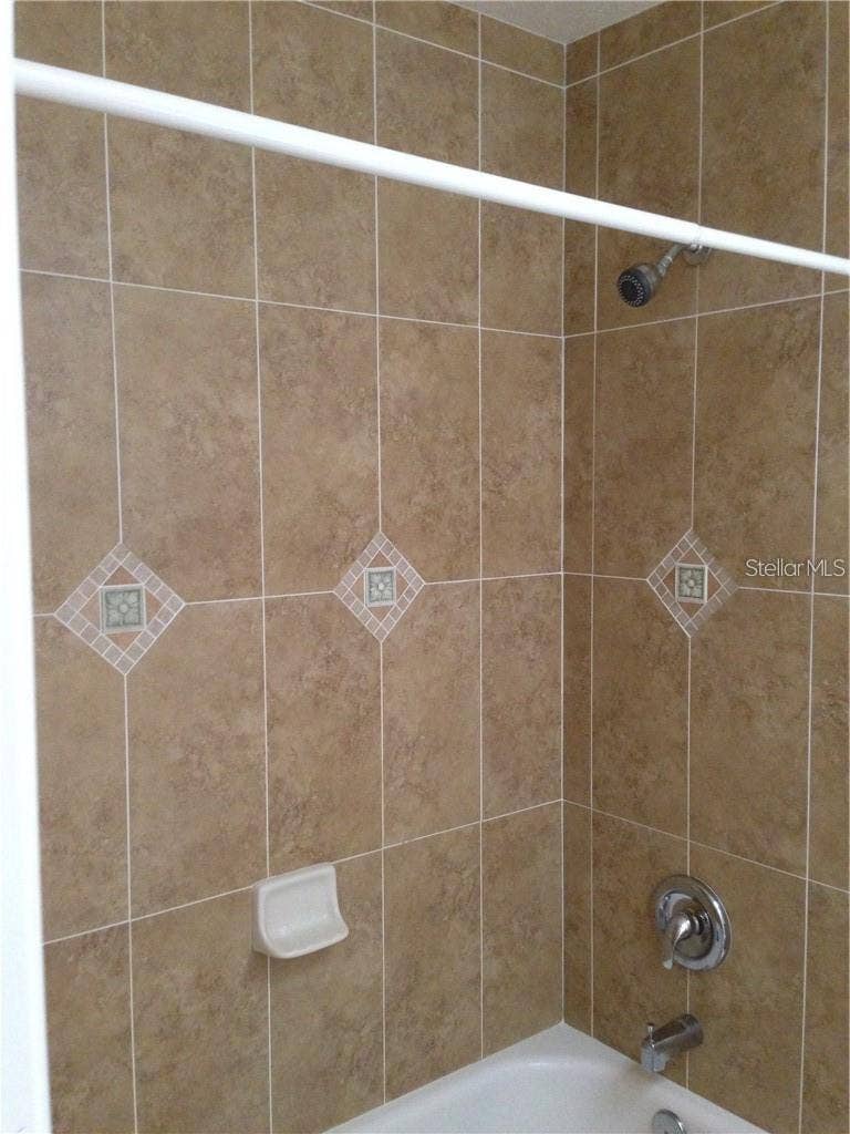 23040 JUMPER AVENUE, Port Charlotte, FL 33952 TILE WALLS IN GUEST BATH 2