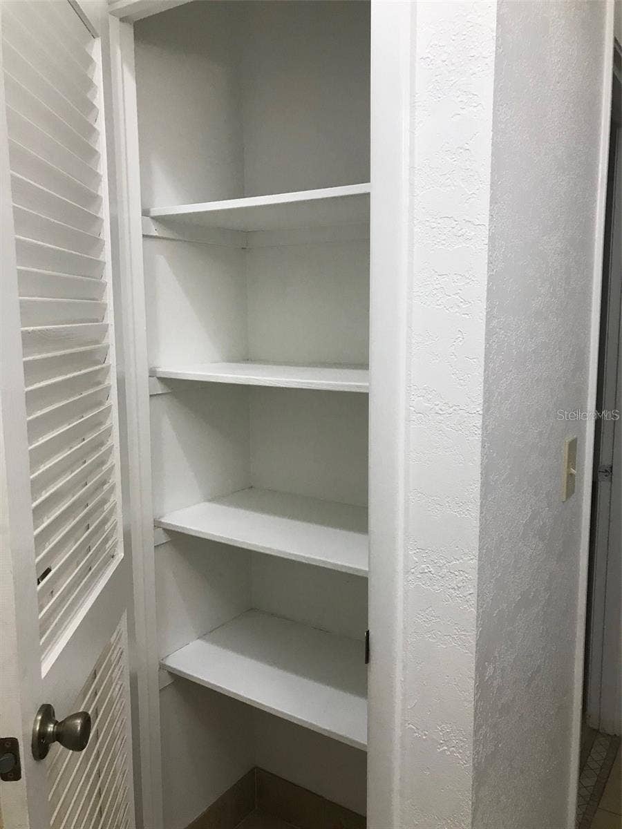 23040 JUMPER AVENUE, Port Charlotte, FL 33952 LINEN CLOSET - HALL OFF GUEST BATH