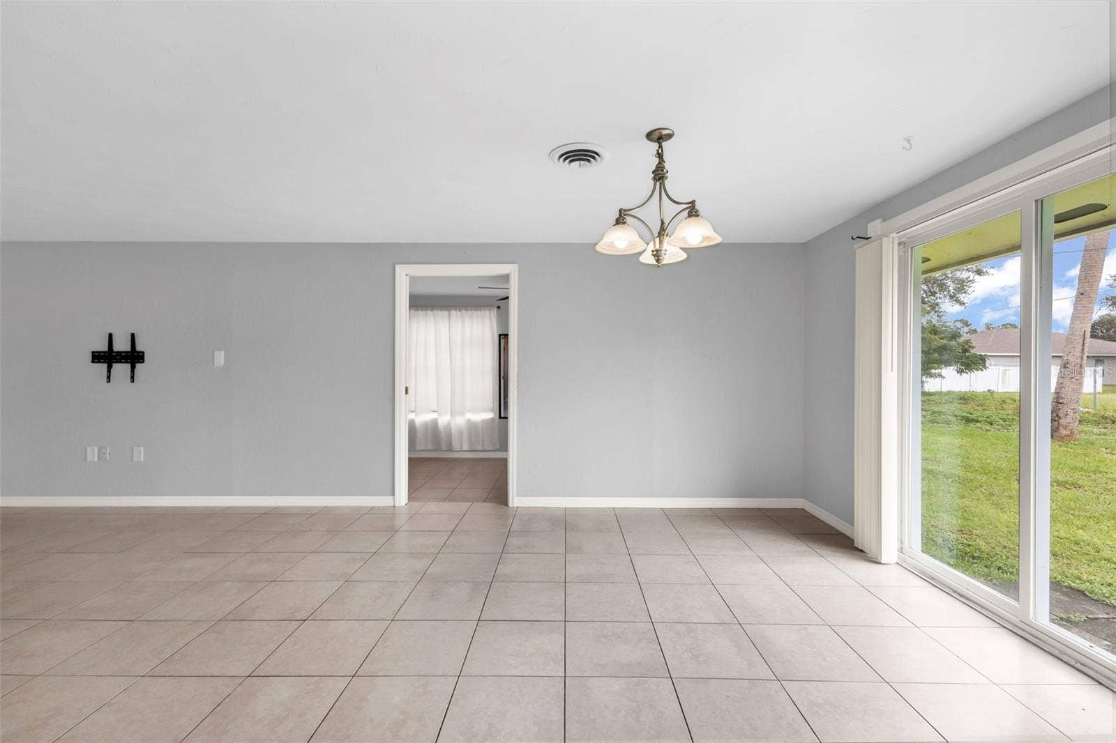 424 VANNELL STREET, Port Charlotte, FL 33954 View of dining room where 3rd bedroom is located.