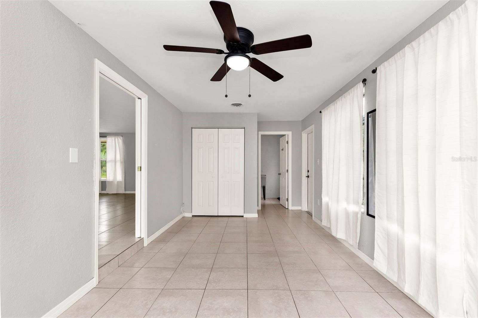 424 VANNELL STREET, Port Charlotte, FL 33954 3rd bedroom located off of living/dining room.
