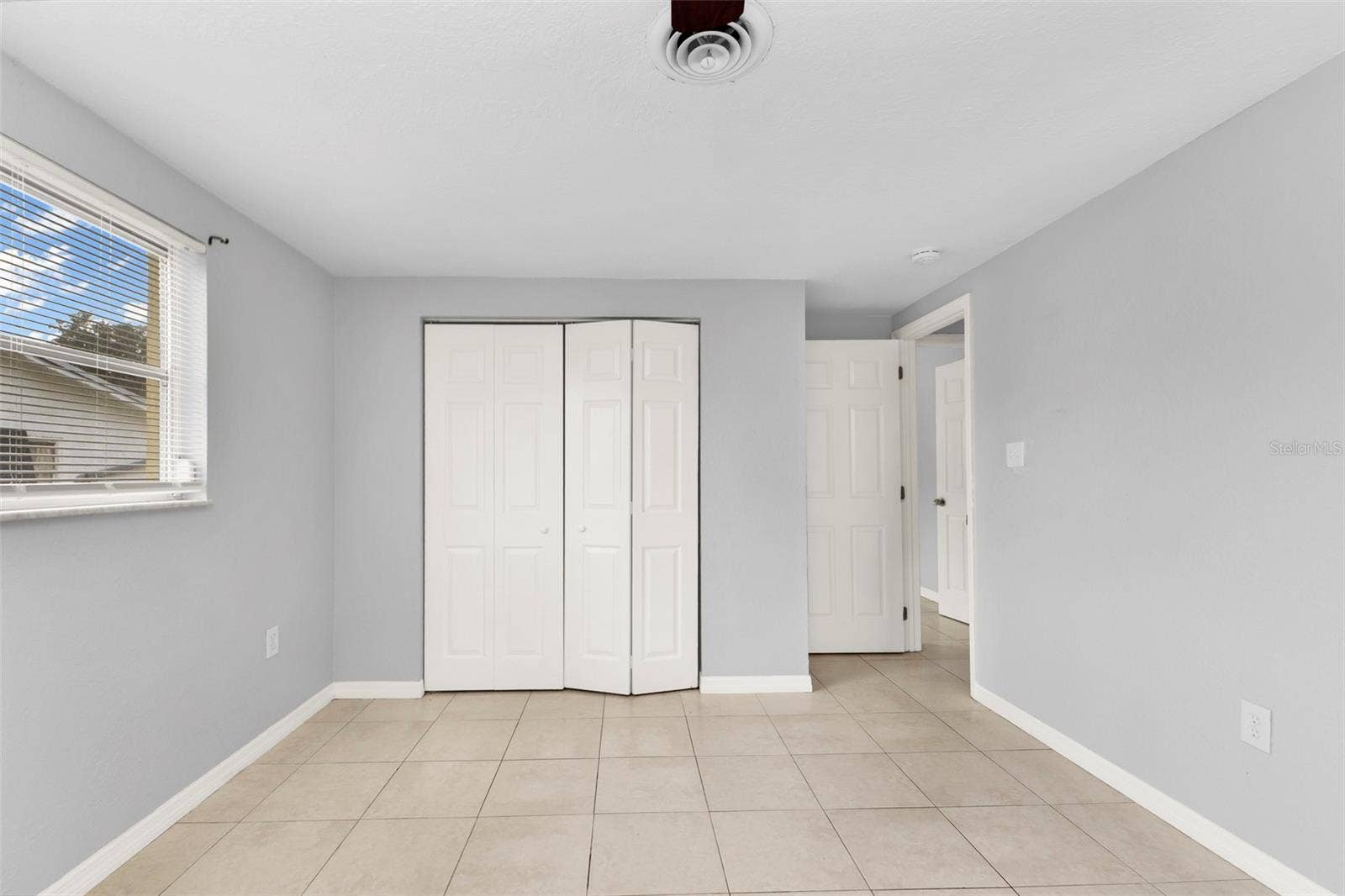 424 VANNELL STREET, Port Charlotte, FL 33954 2nd guest bedroom with built in closet.