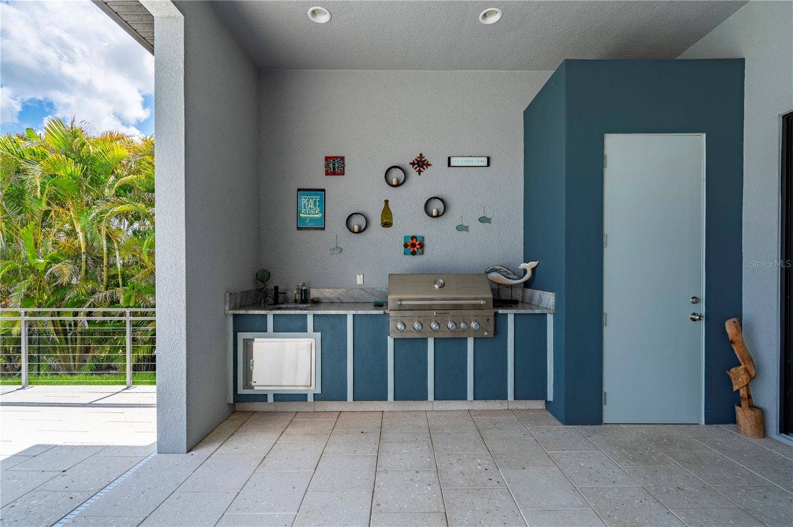 25462 SHORE DRIVE, Punta Gorda, FL 33950 Outdoor kitchen and pool storage