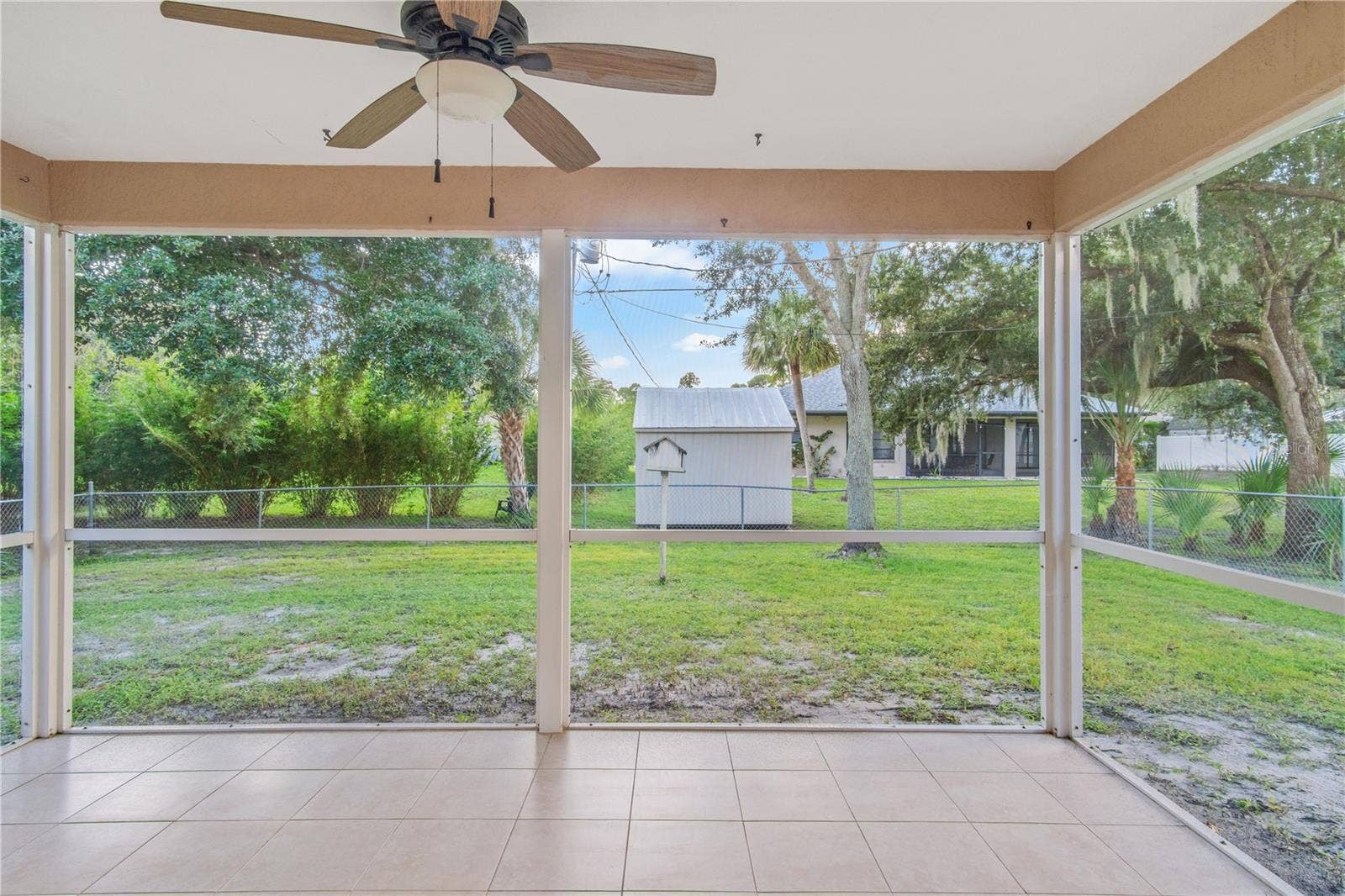 17433 HARRIS AVENUE, Port Charlotte, FL 33948 Patio overlooking backyard