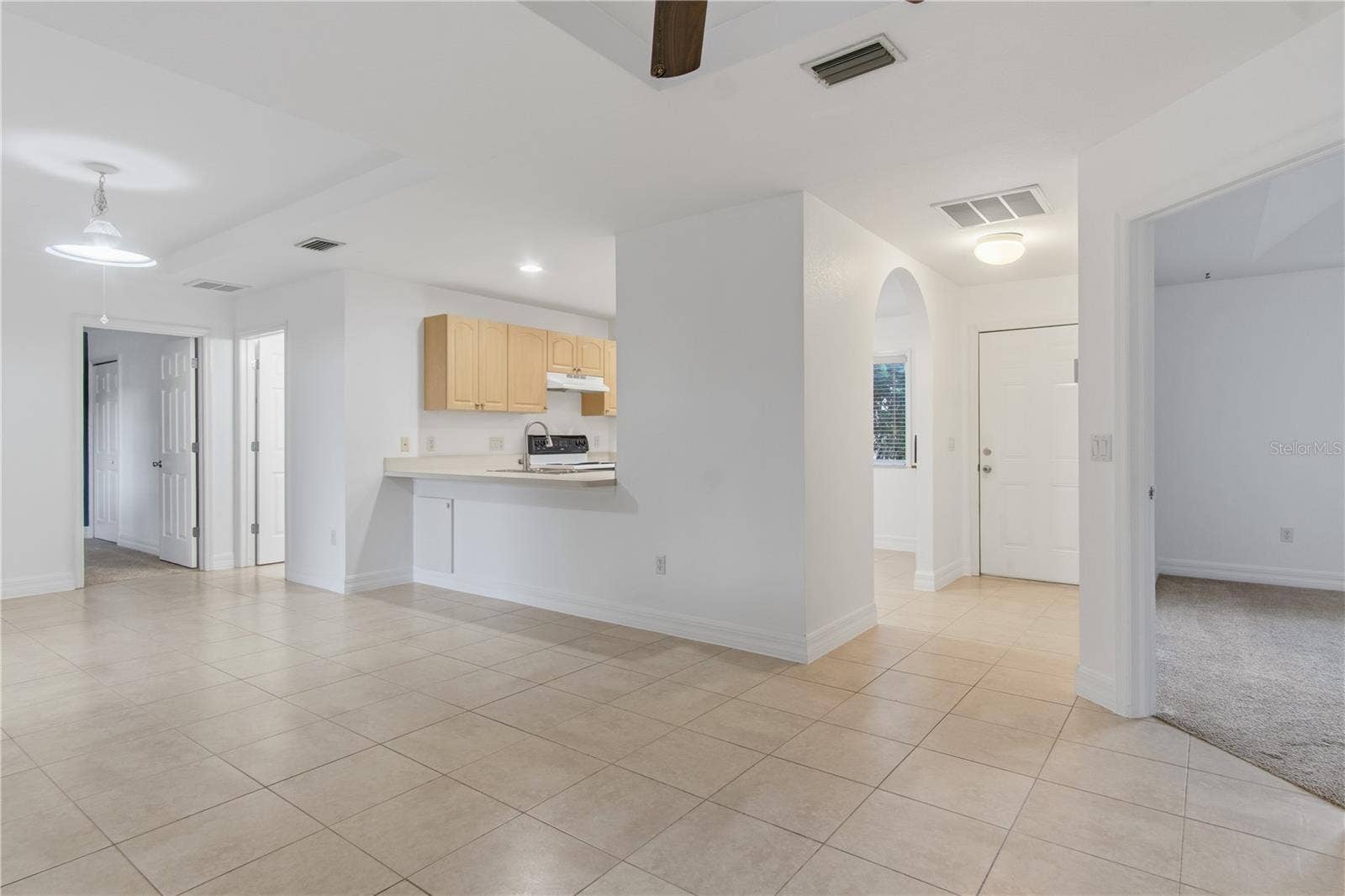 17433 HARRIS AVENUE, Port Charlotte, FL 33948 Living / kitchen area