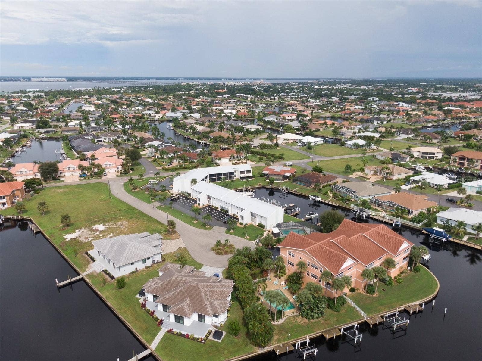 1318 WESLEY DRIVE, #124B, Punta Gorda, FL 33950 Arial View Charlotte Harbor in the Distance and Sunseeker Resort