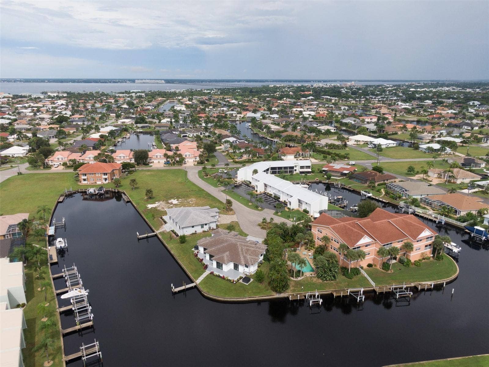 1318 WESLEY DRIVE, #124B, Punta Gorda, FL 33950 Front of building (white building on right)