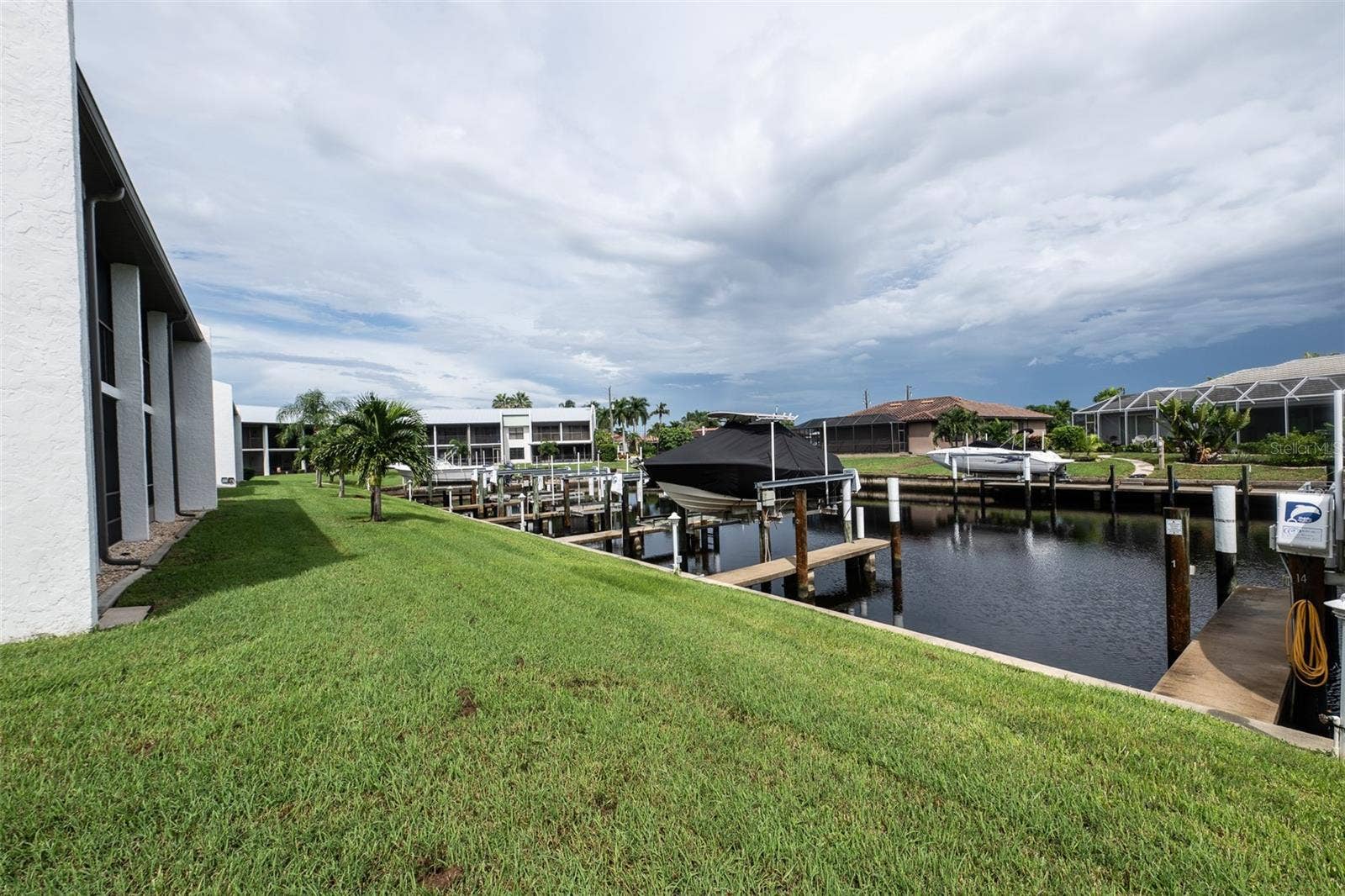 1318 WESLEY DRIVE, #124B, Punta Gorda, FL 33950 view of docks