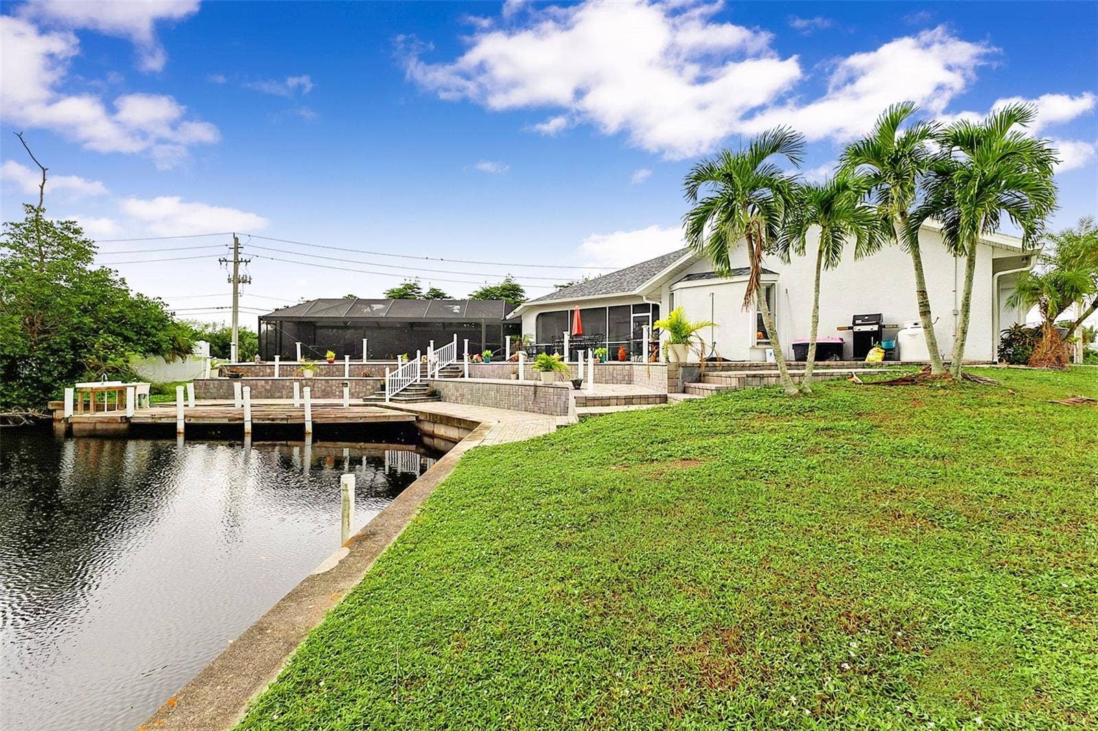 614 RIO VILLA DRIVE, Punta Gorda, FL 33950 Canal and Backyard