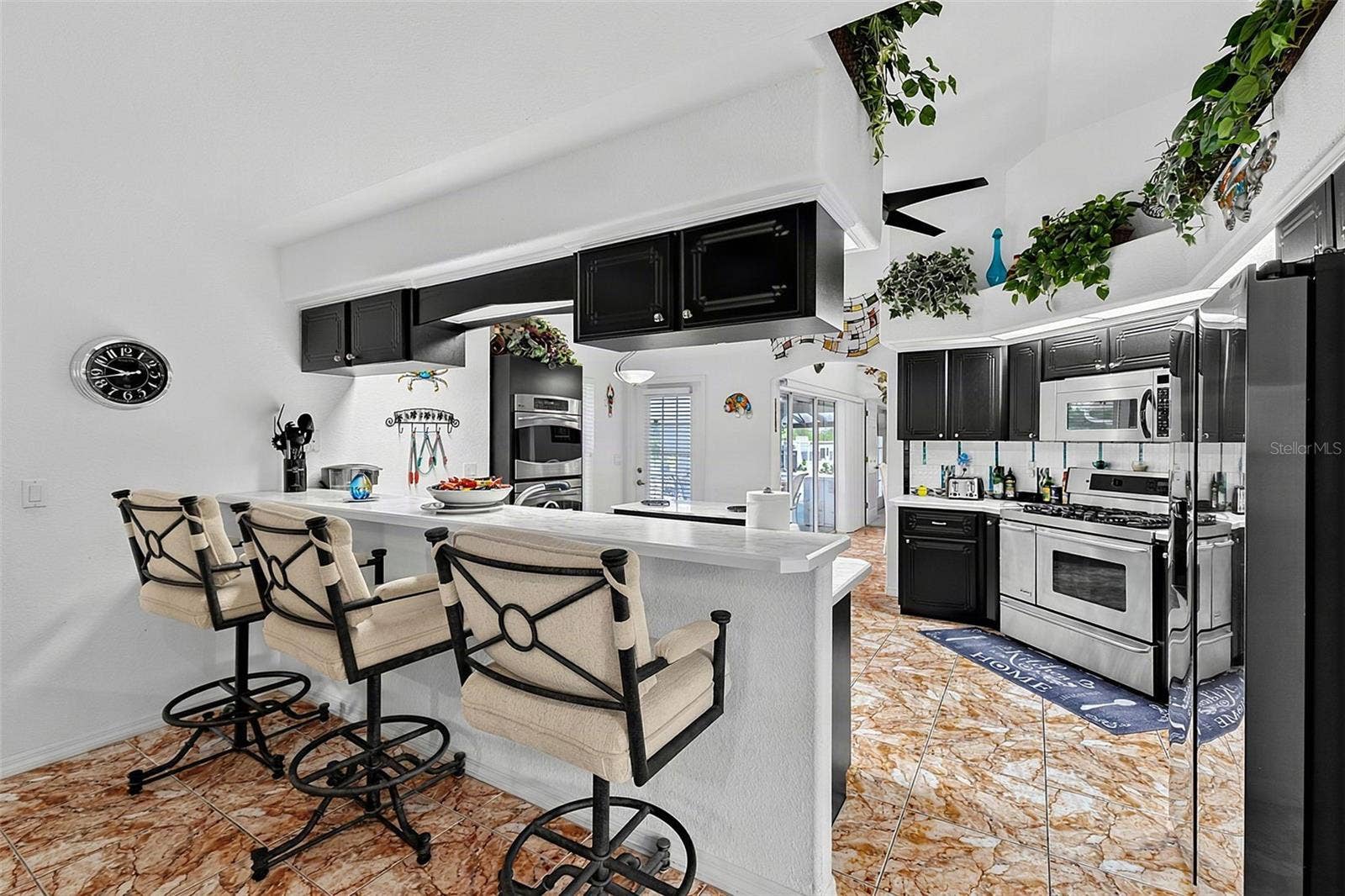614 RIO VILLA DRIVE, Punta Gorda, FL 33950 Kitchen with Breakfast Bar