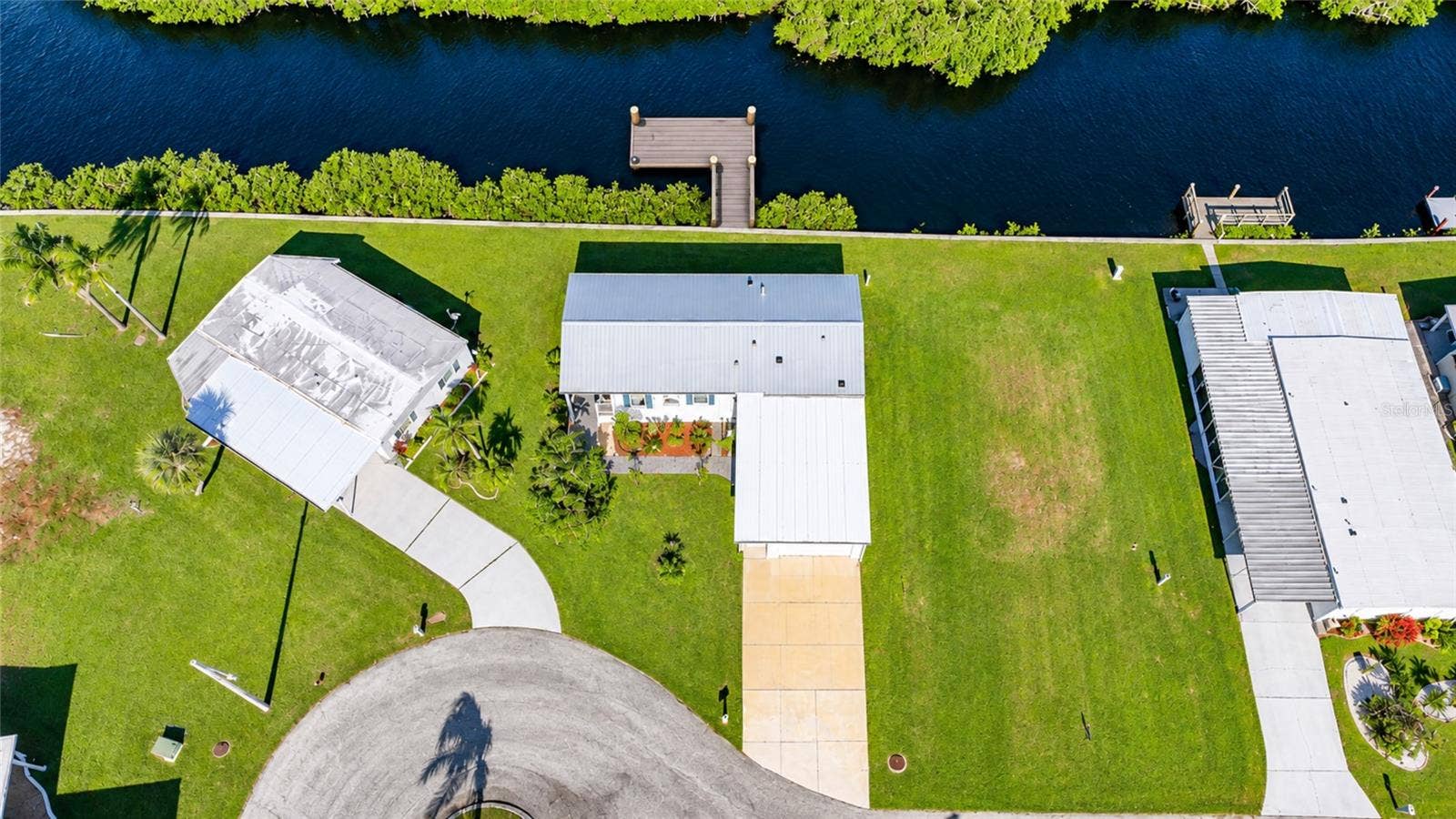 734 BLACKBURN BOULEVARD, North Port, FL 34287 AI image with Dock