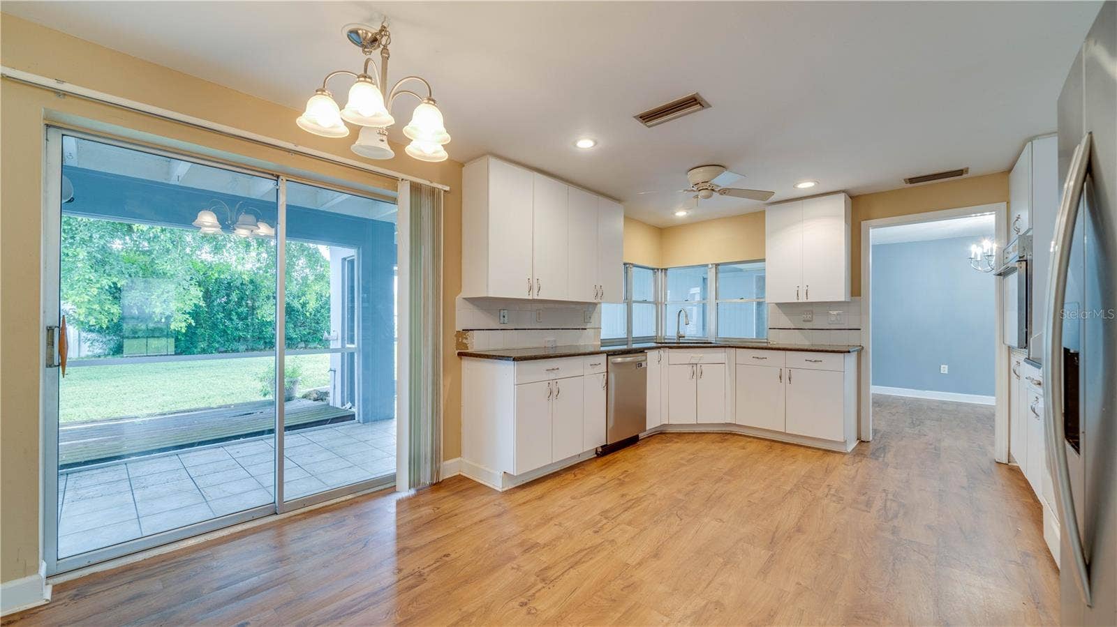 Eat-in kitchen with lanai access.