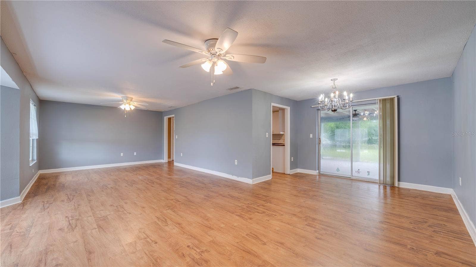 An expansive family room and a designated dining area.