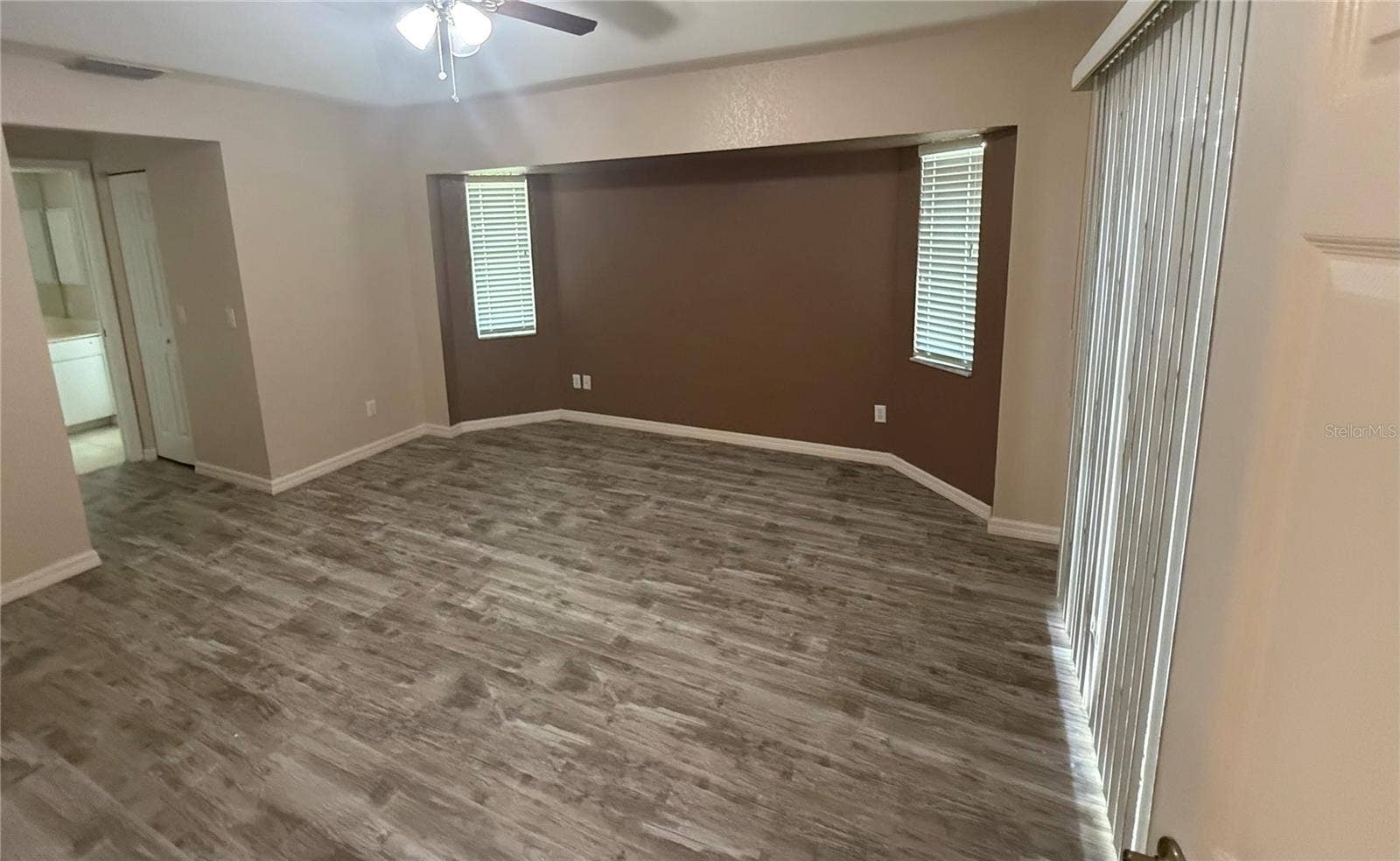 4055 ALLURE LANE, North Port, FL 34287 Primary Bedroom and sliders out to the lanai.