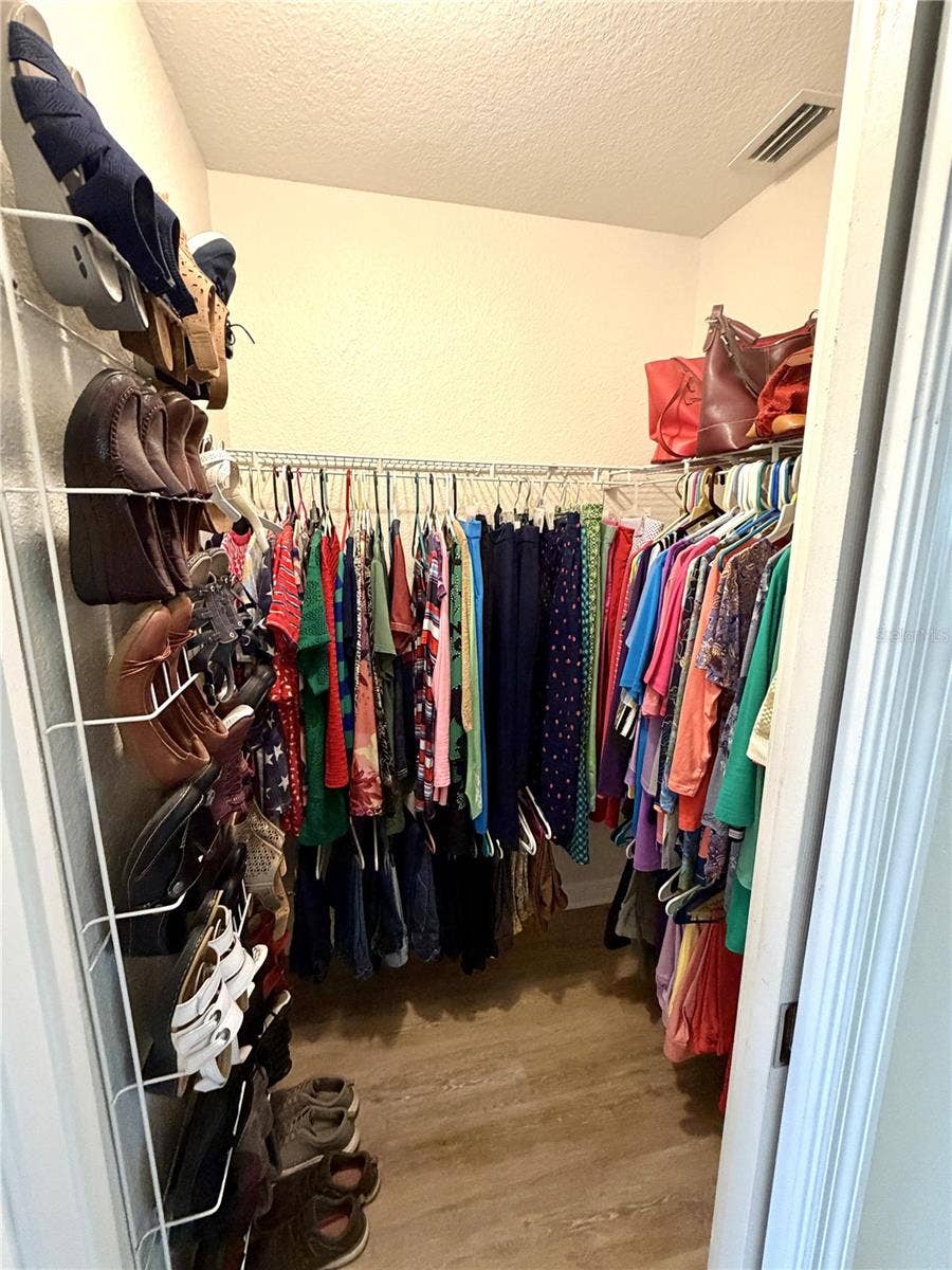 23411 MULLINS AVENUE, Port Charlotte, FL 33954 Primary Bedroom 1st walk-in closet