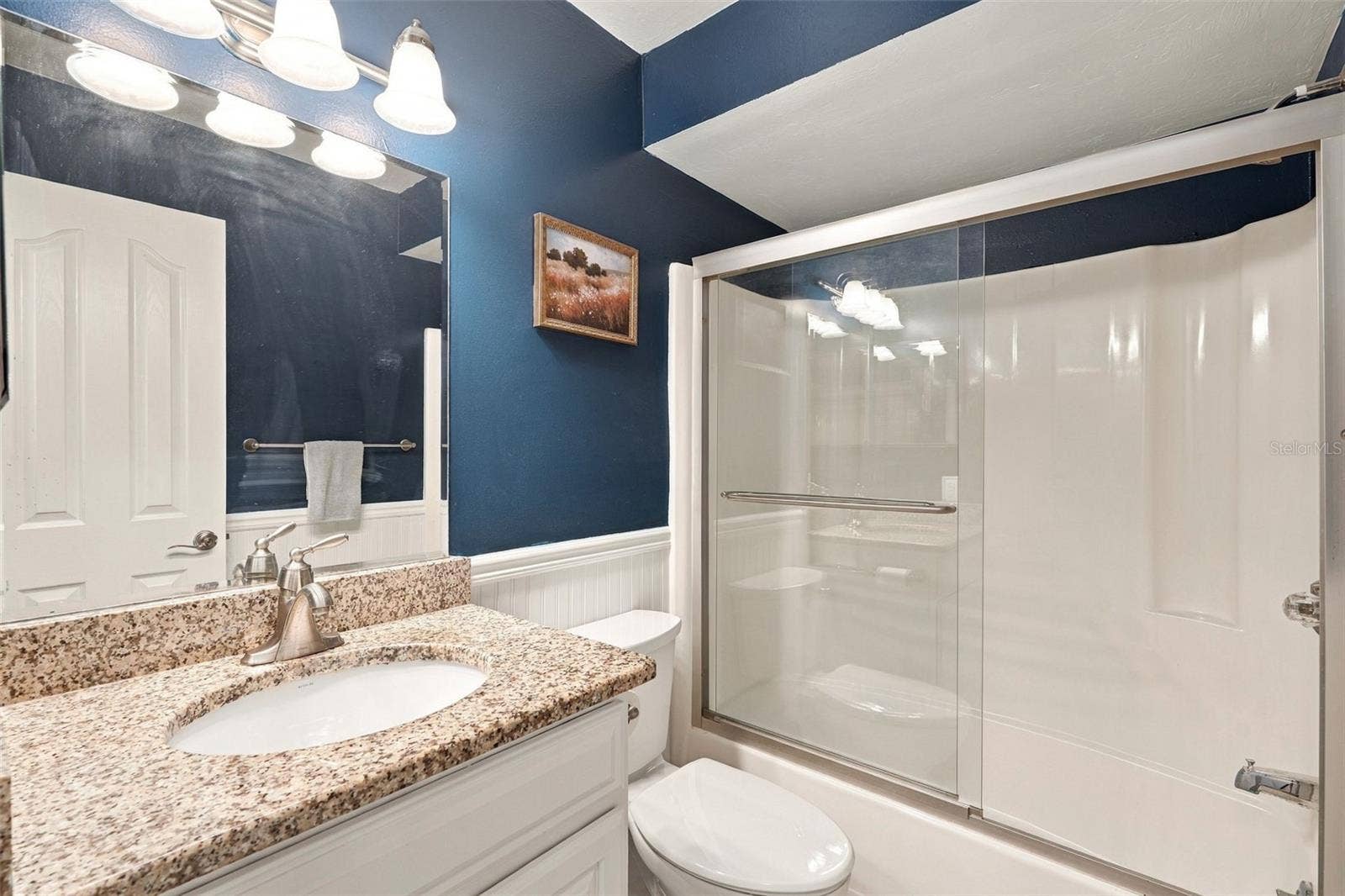 12538 SW KINGSWAY CIRCLE, #1008, Lake Suzy, FL 34269 Guest Bathroom Features Granite Countertops and Tub/Shower Combo