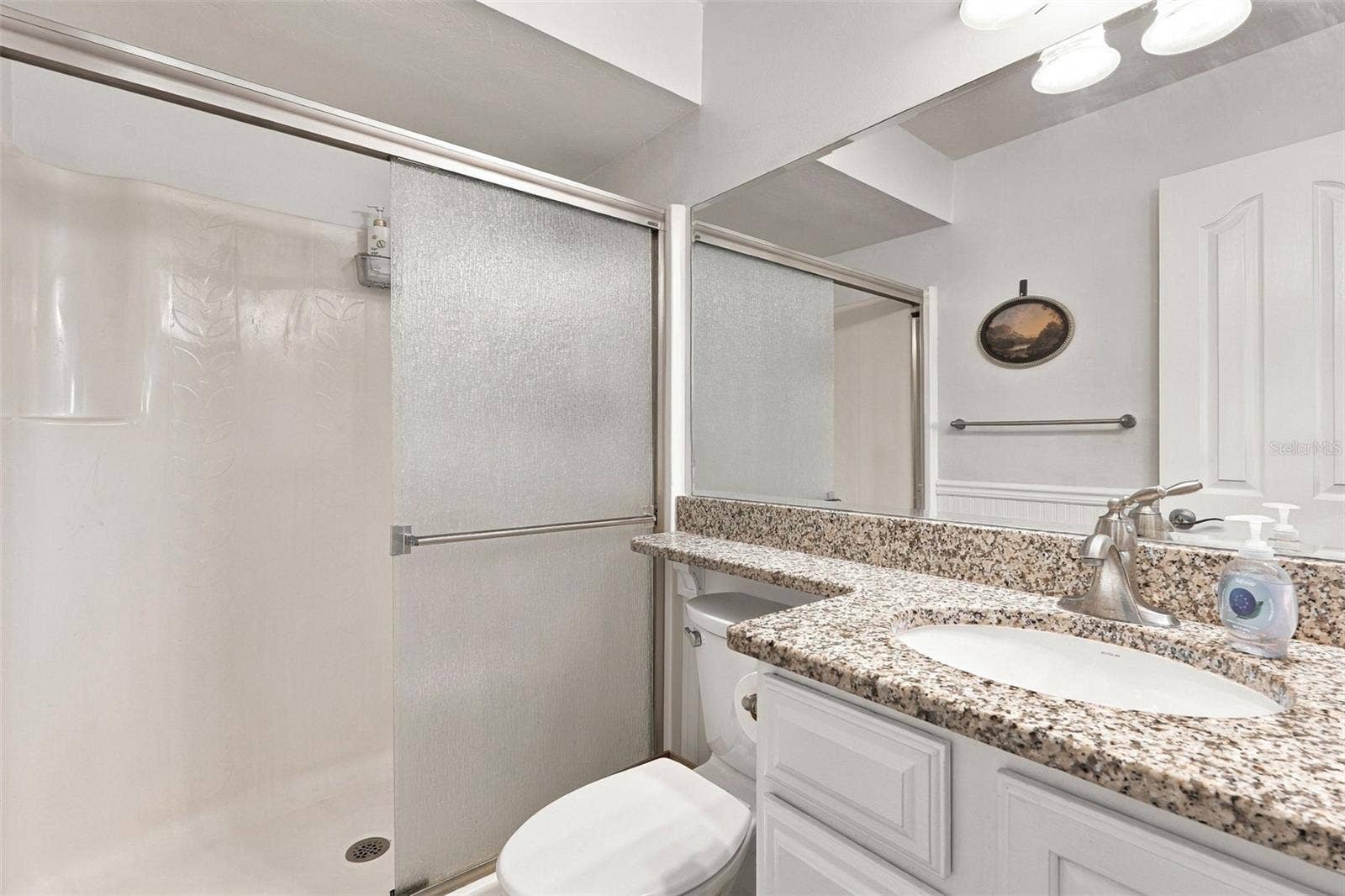 12538 SW KINGSWAY CIRCLE, #1008, Lake Suzy, FL 34269 Spacious Walk-In Shower with Granite Top Vanity